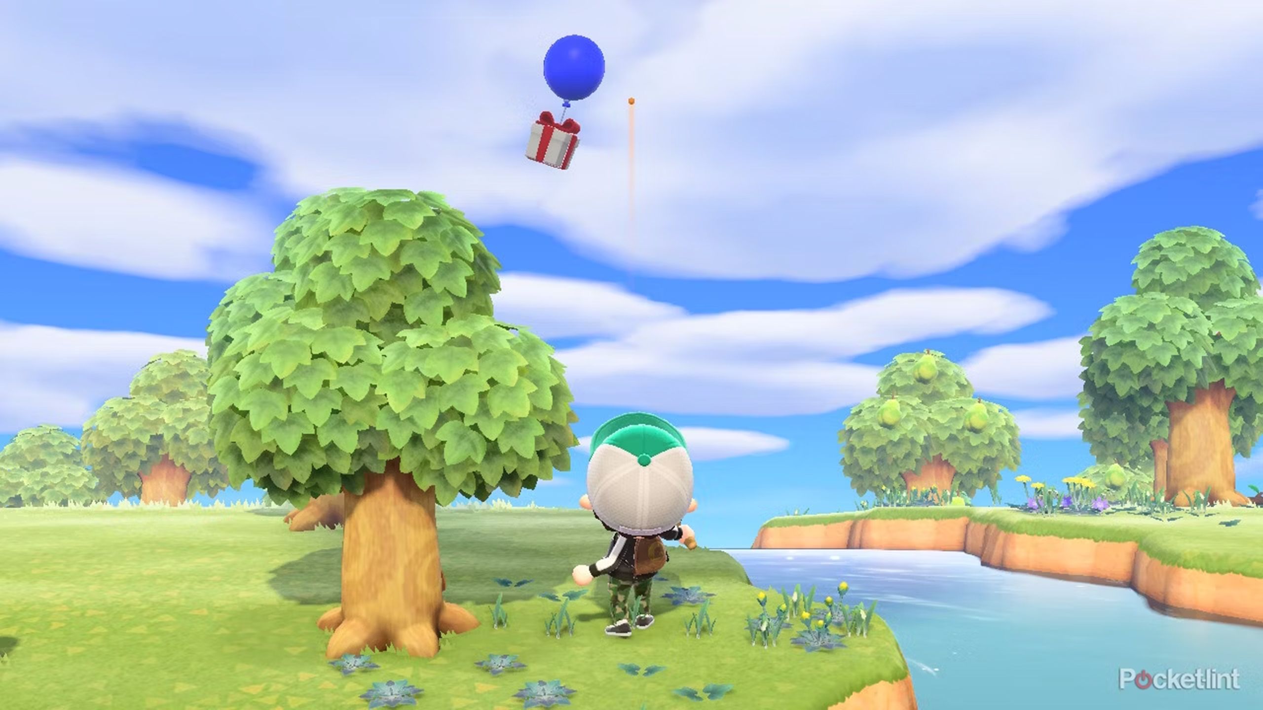 A gift suspended by balloon in Animal Crossing New Horizons