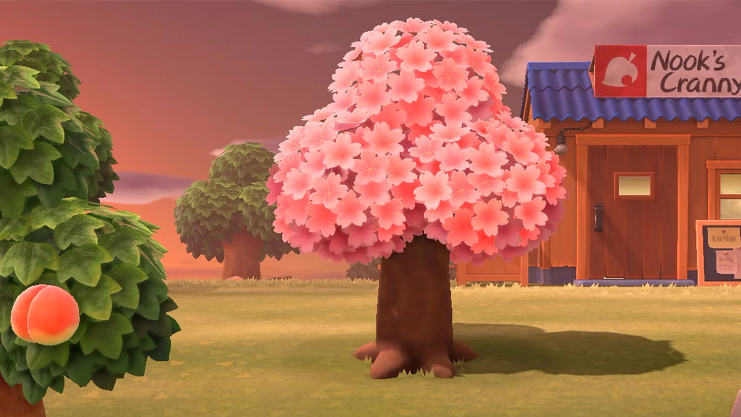 A tree with pink blossom in Animal Crossing New Horizons