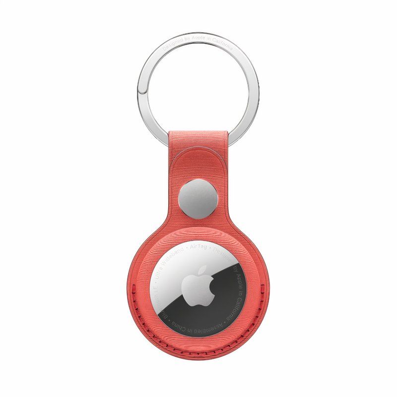 A red fabric clasp attached to a silver key ring.