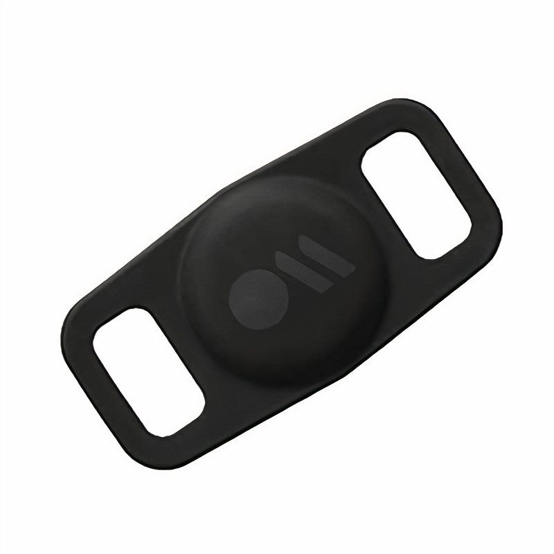 A black rubber case for the AirTag, designed to fit through a dog's collar.