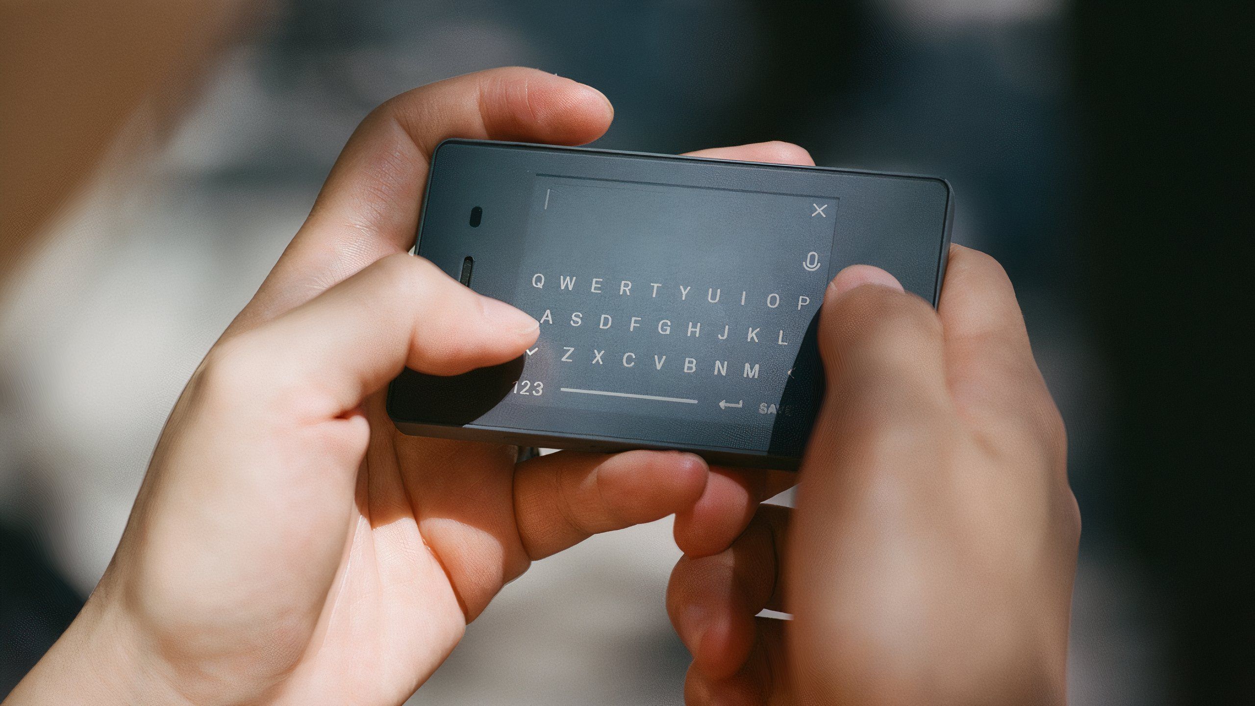 Writing SMS on the Light Phone II.