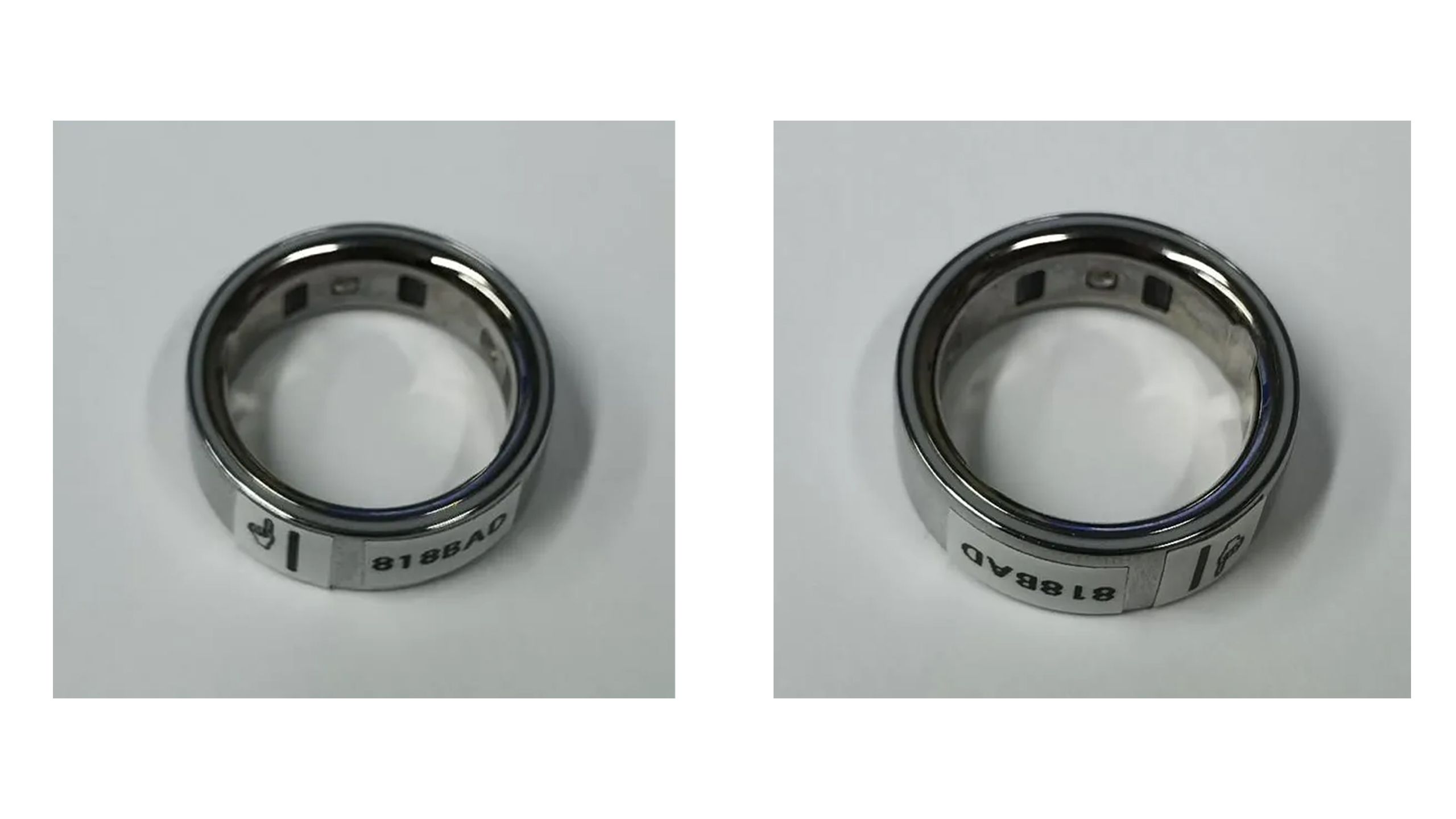 Two Oura Ring 4 models resting on a white table. 