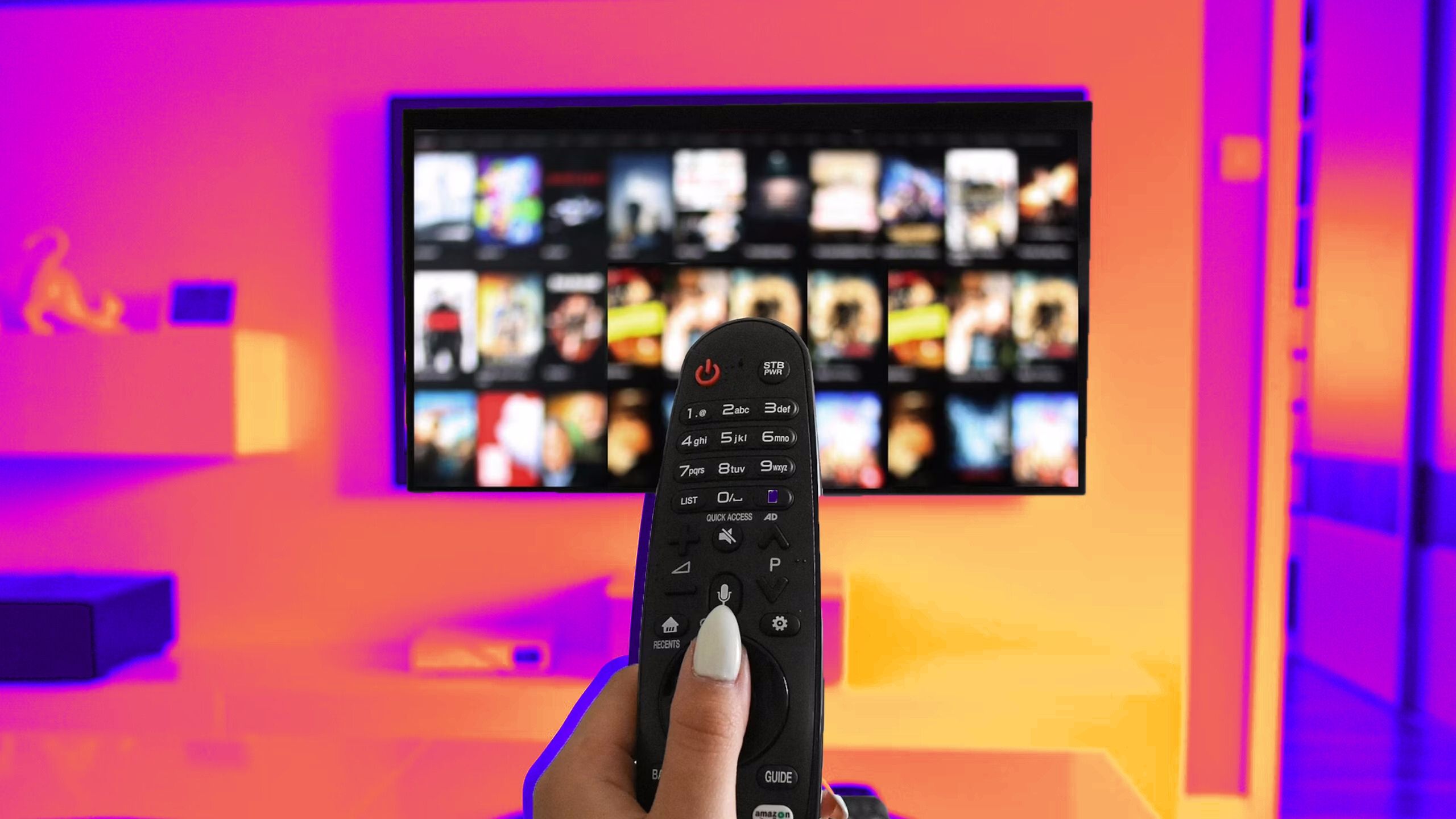 a multimedia remote control for controlling a streaming service on a colored background