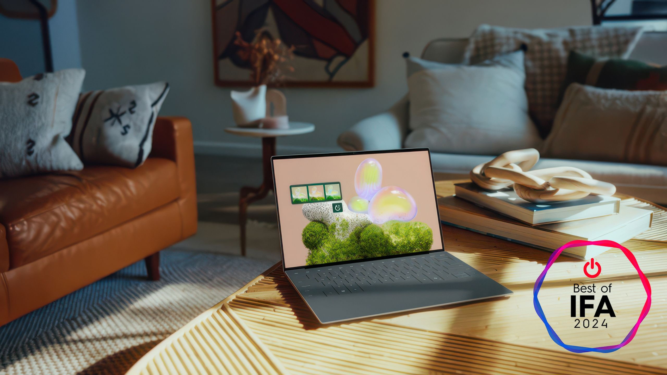 The Dell XPS 13 laptop sits on a coffee table in a living room. 