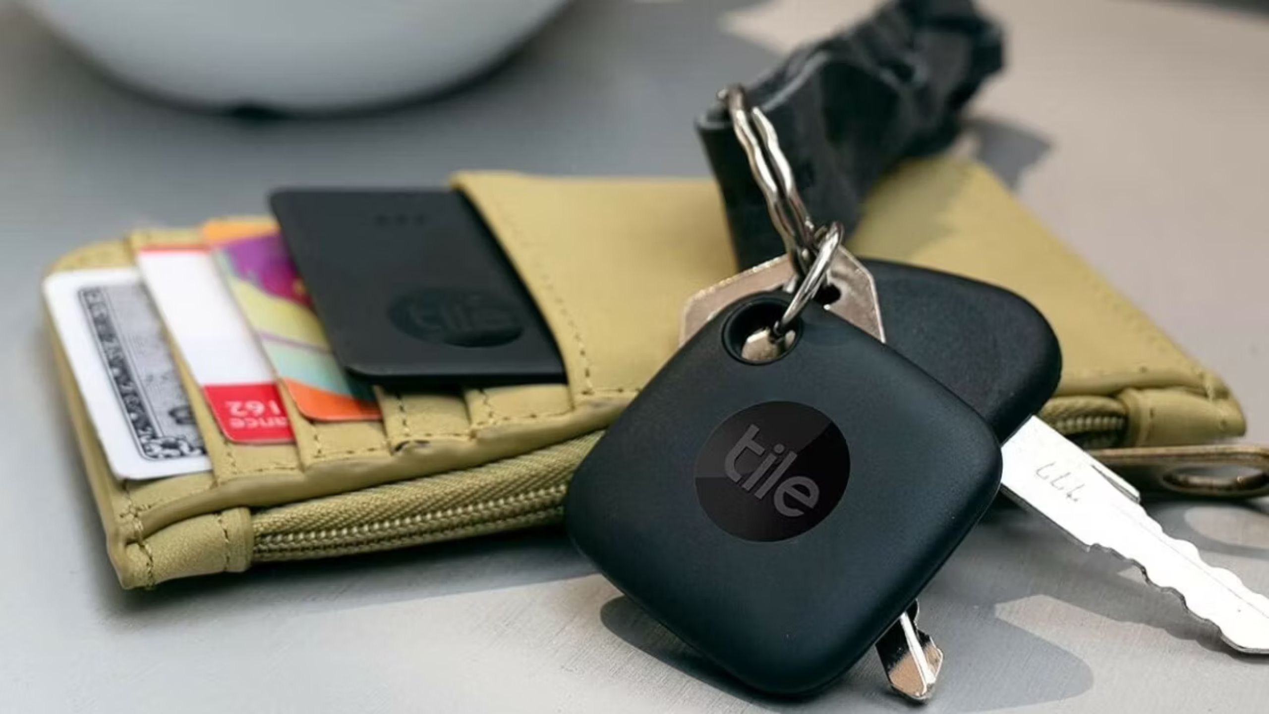 A black Tile on a key ring