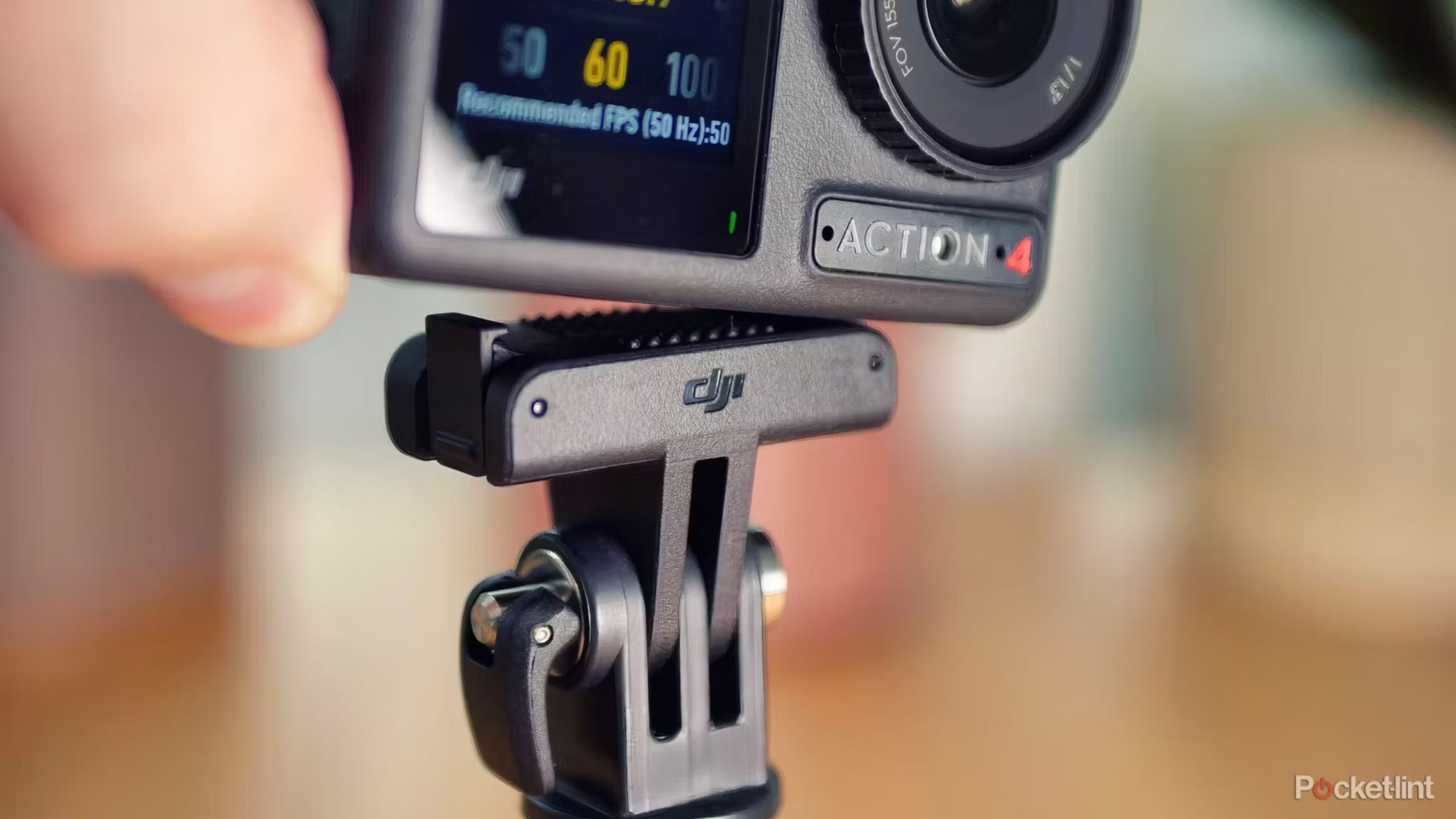 DJI Osmo Action 4 on a mount. 