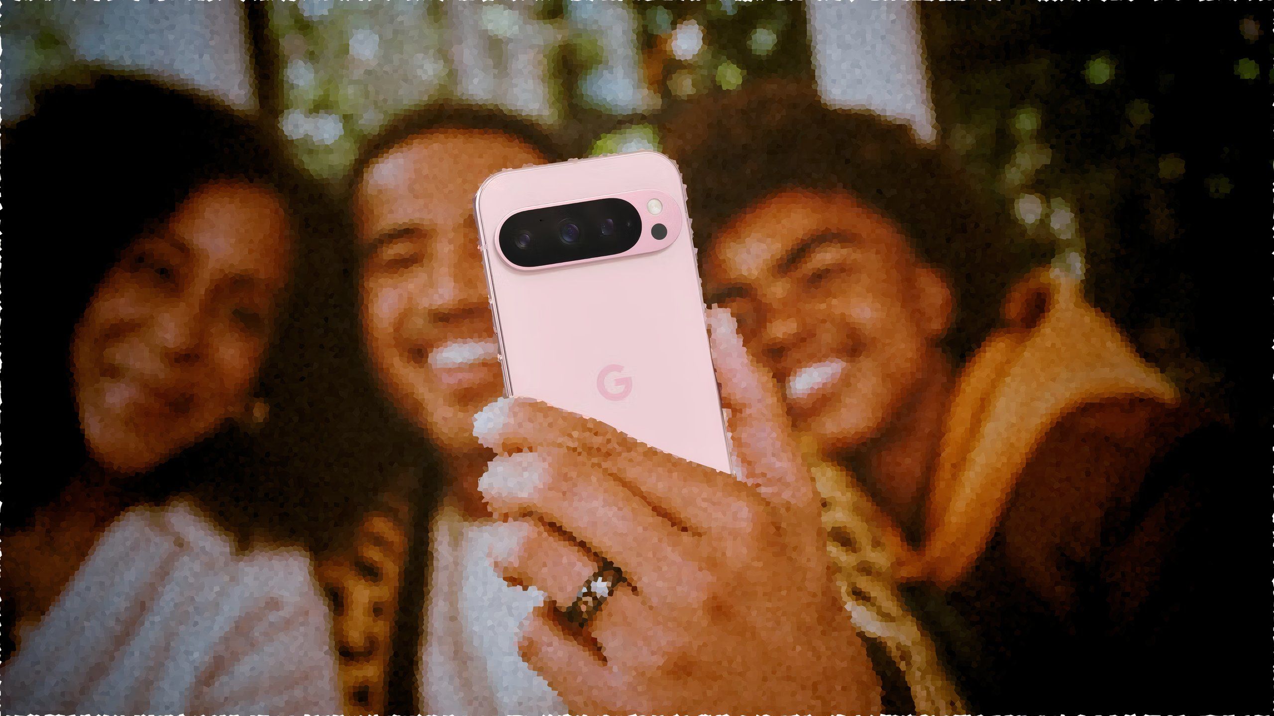 A group of people taking a selfie with a Pixel 9 Pro.