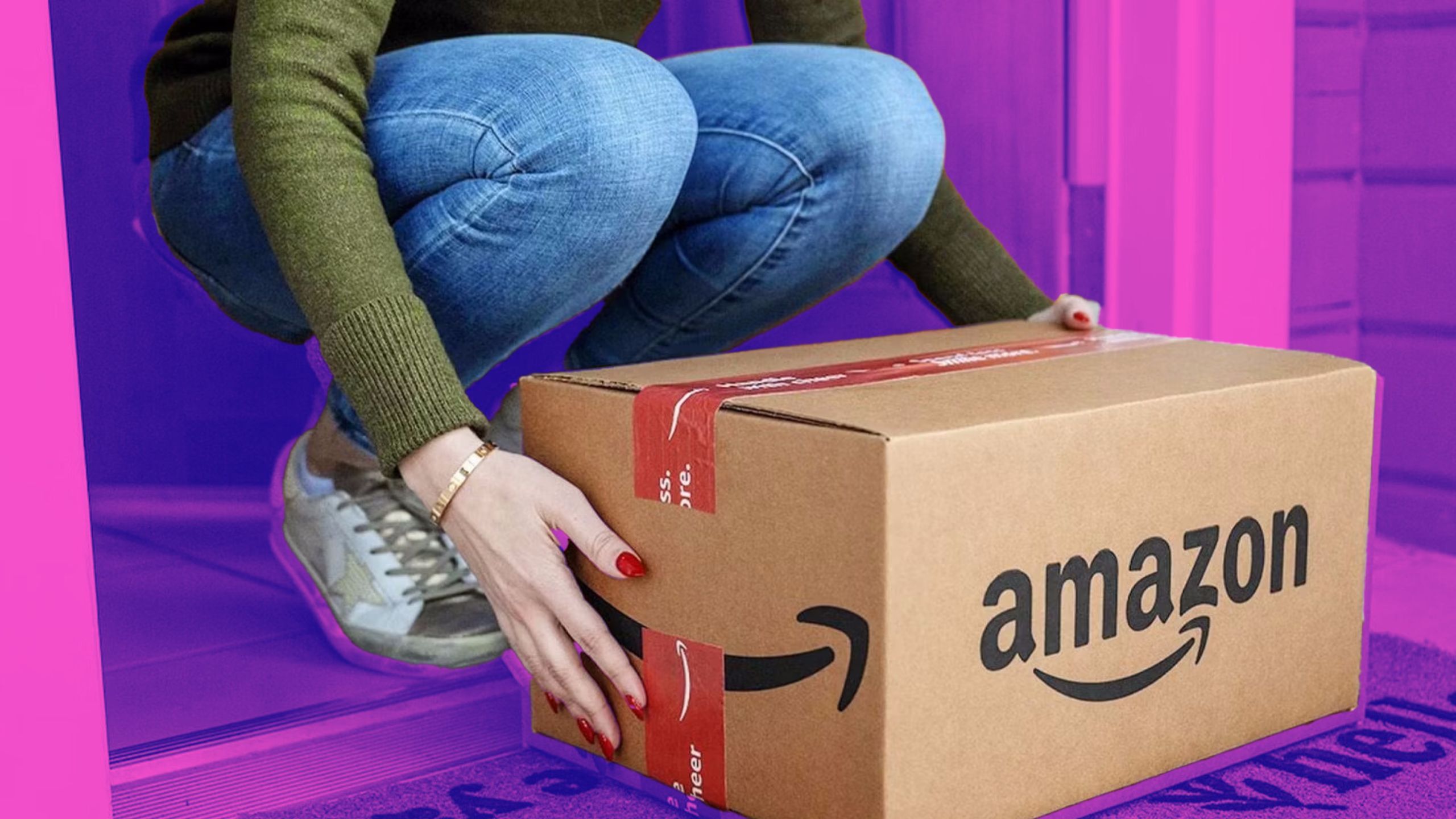 A woman holding an Amazon box 