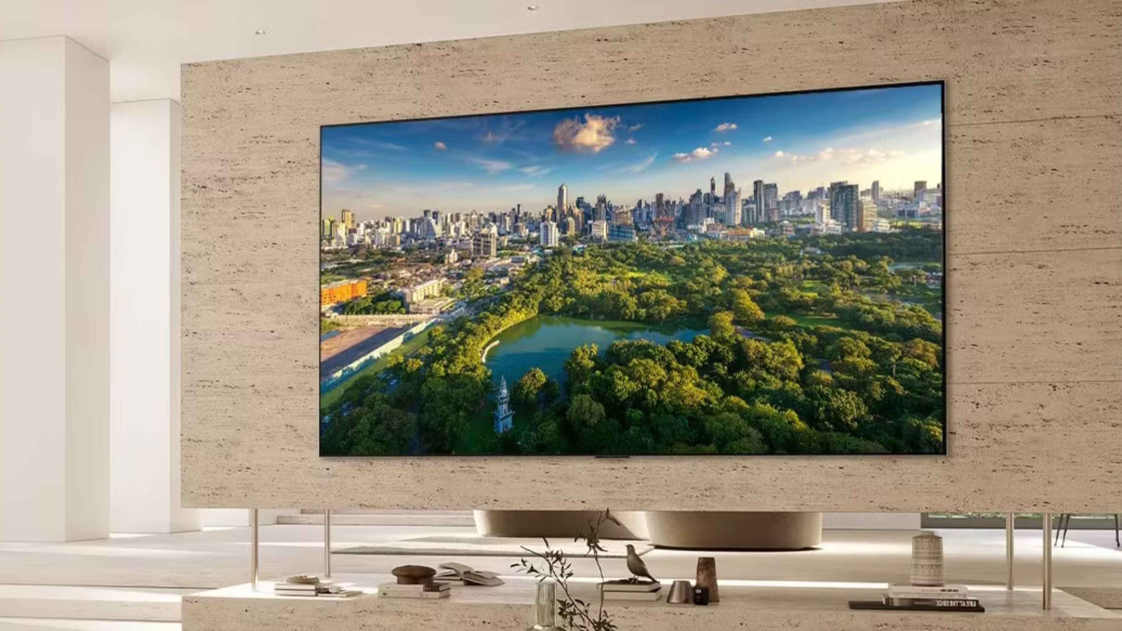 LG OLED TV in living room with screen showing a park