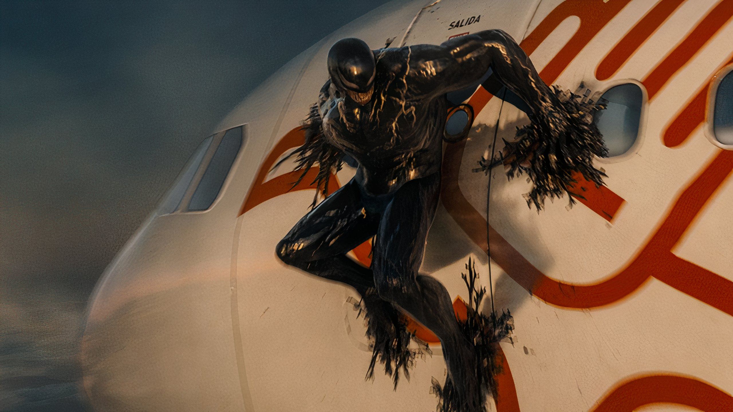 Scene from Venom:The Last Dance with Venom on the outside of a plane