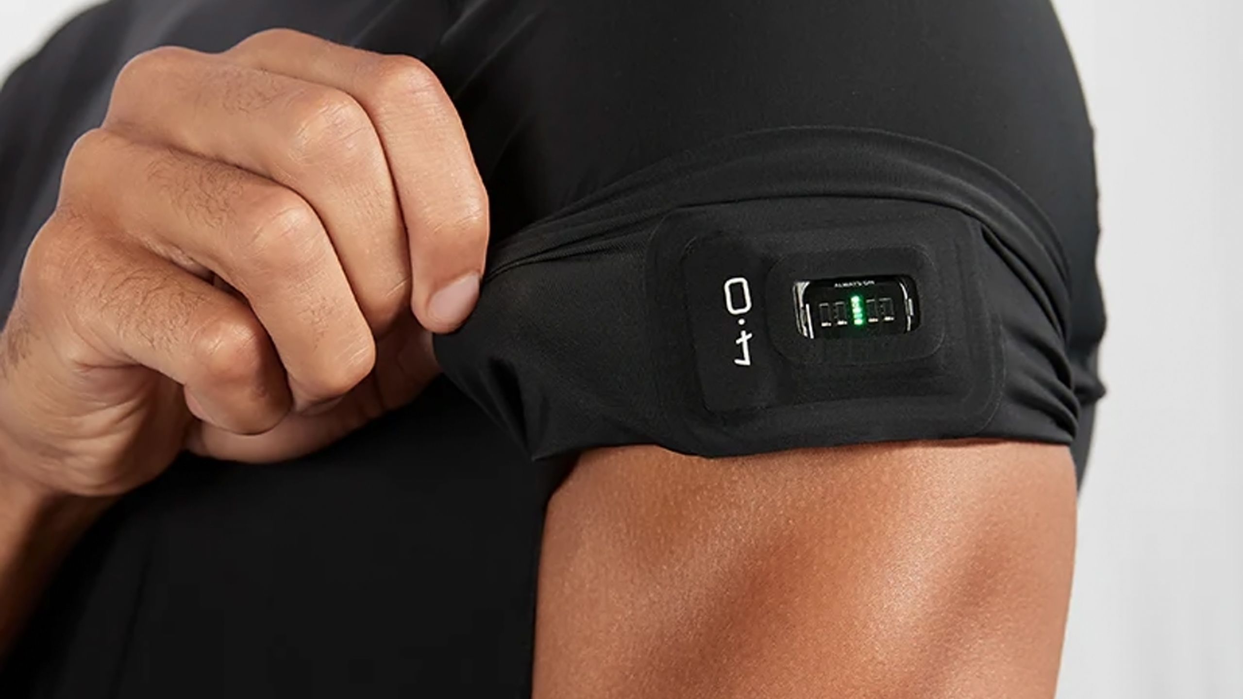 The Whoop Compression Top with a 4.0 tracker inserted.