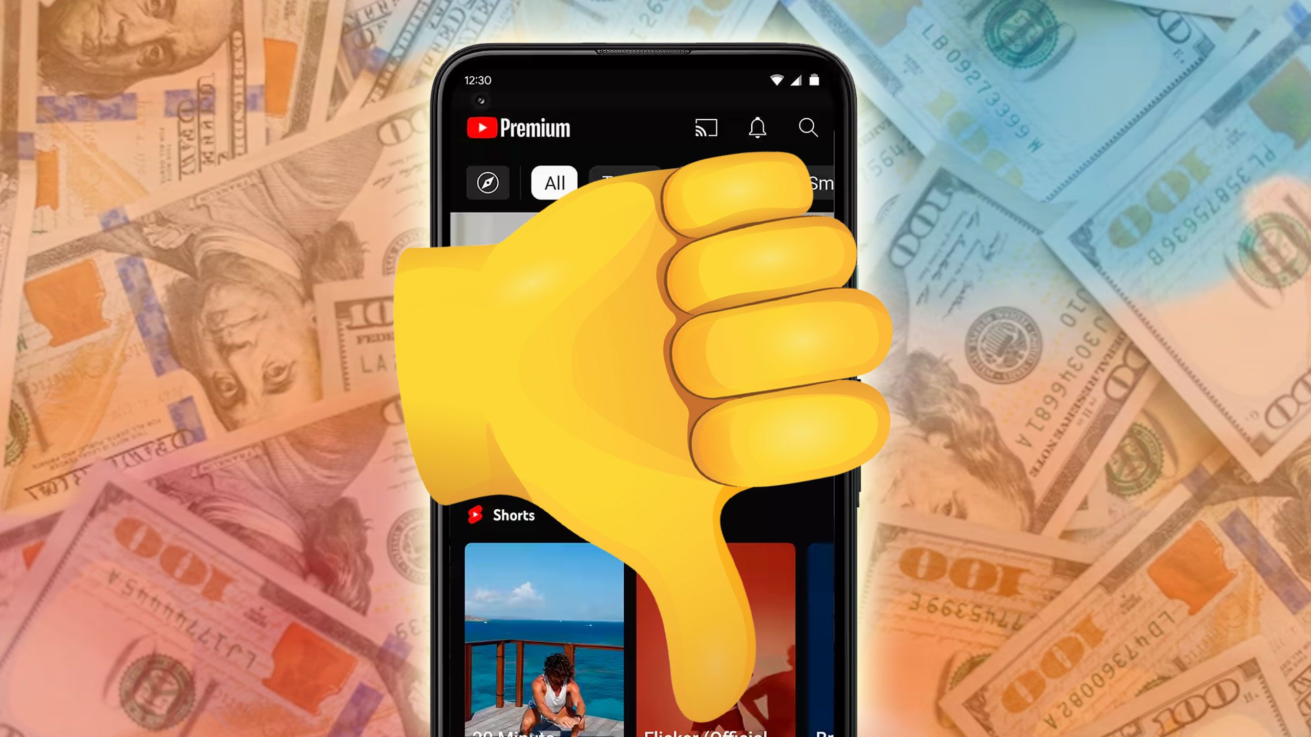 A thumbs-down on top of a phone on top of money. 