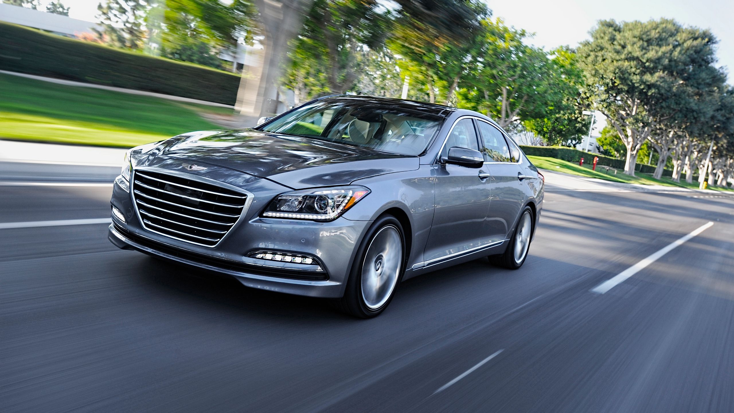 Front quarter view of the 2015 Hyundai Genesis driving