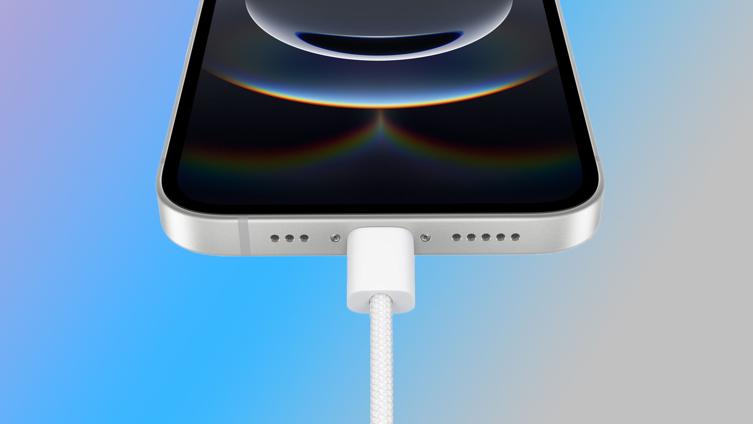 iPhone 16e charging on blue background.