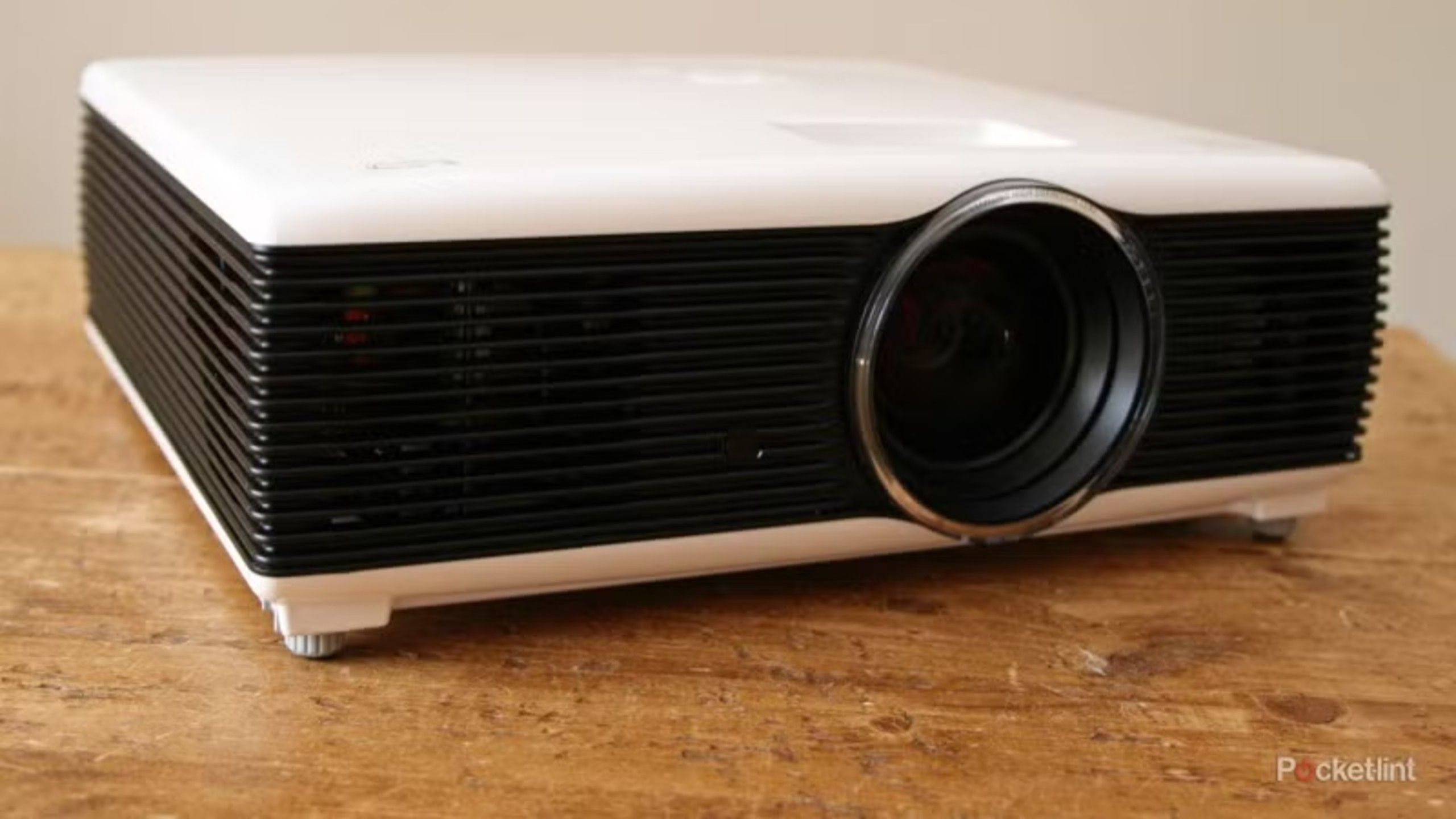 Projector on a wooden table. 