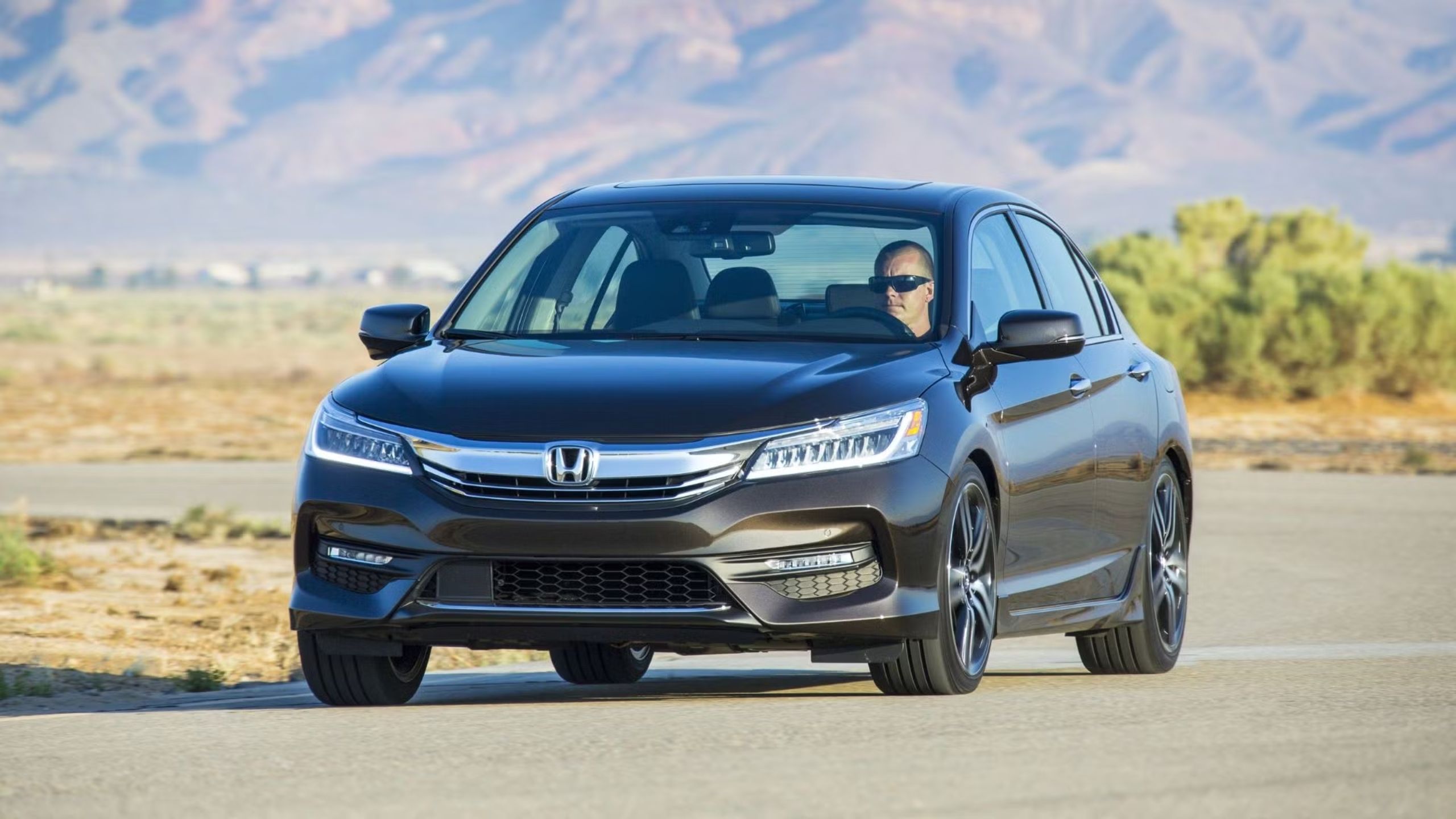 Front quarter view of the 2016 Honda Accord sedan driving