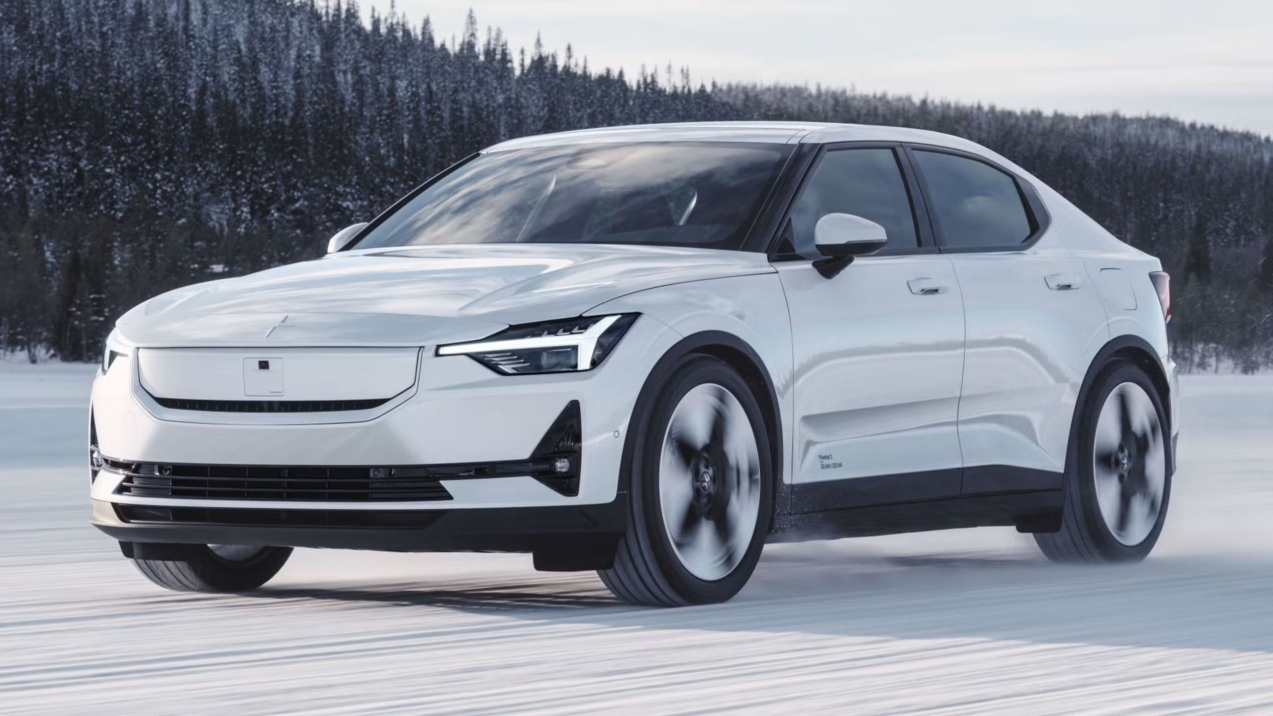 Image of the 2024 Polestar 2 driving on snow