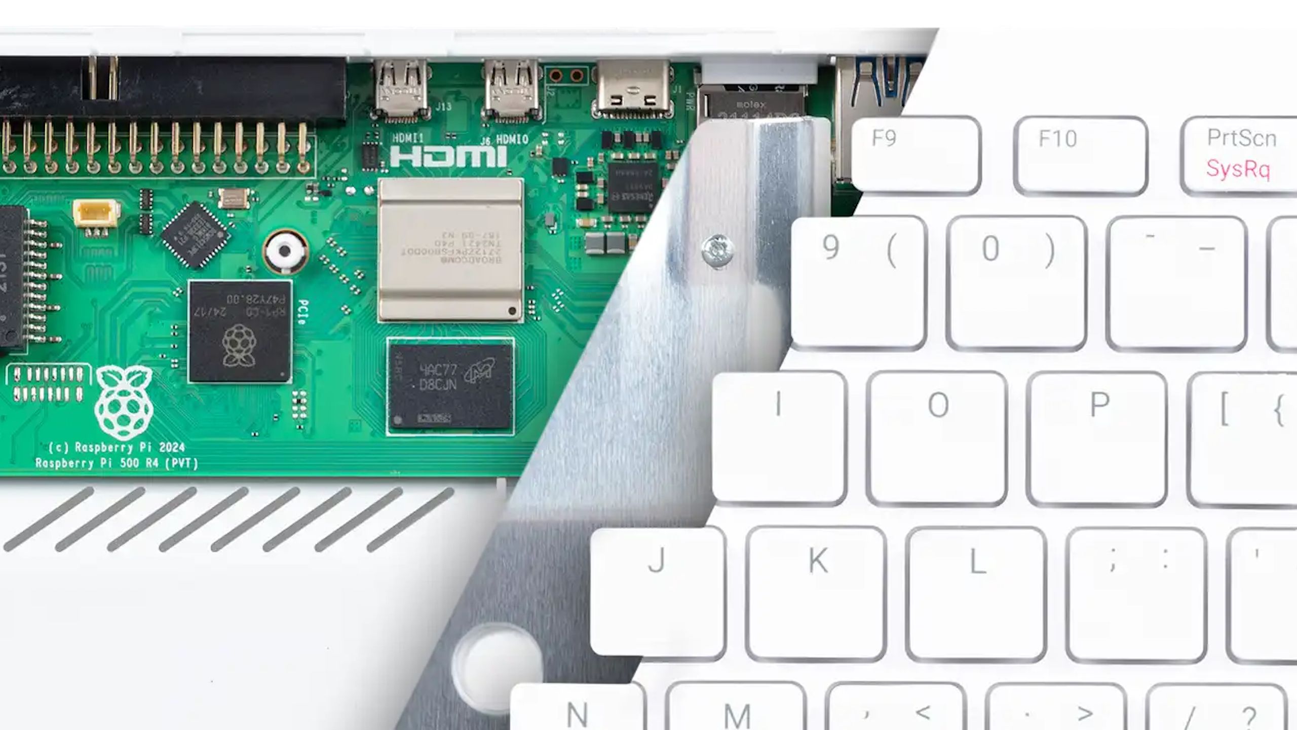 A cutway of a Raspberry Pi 500 showing the keyboard and the SBC beneath.