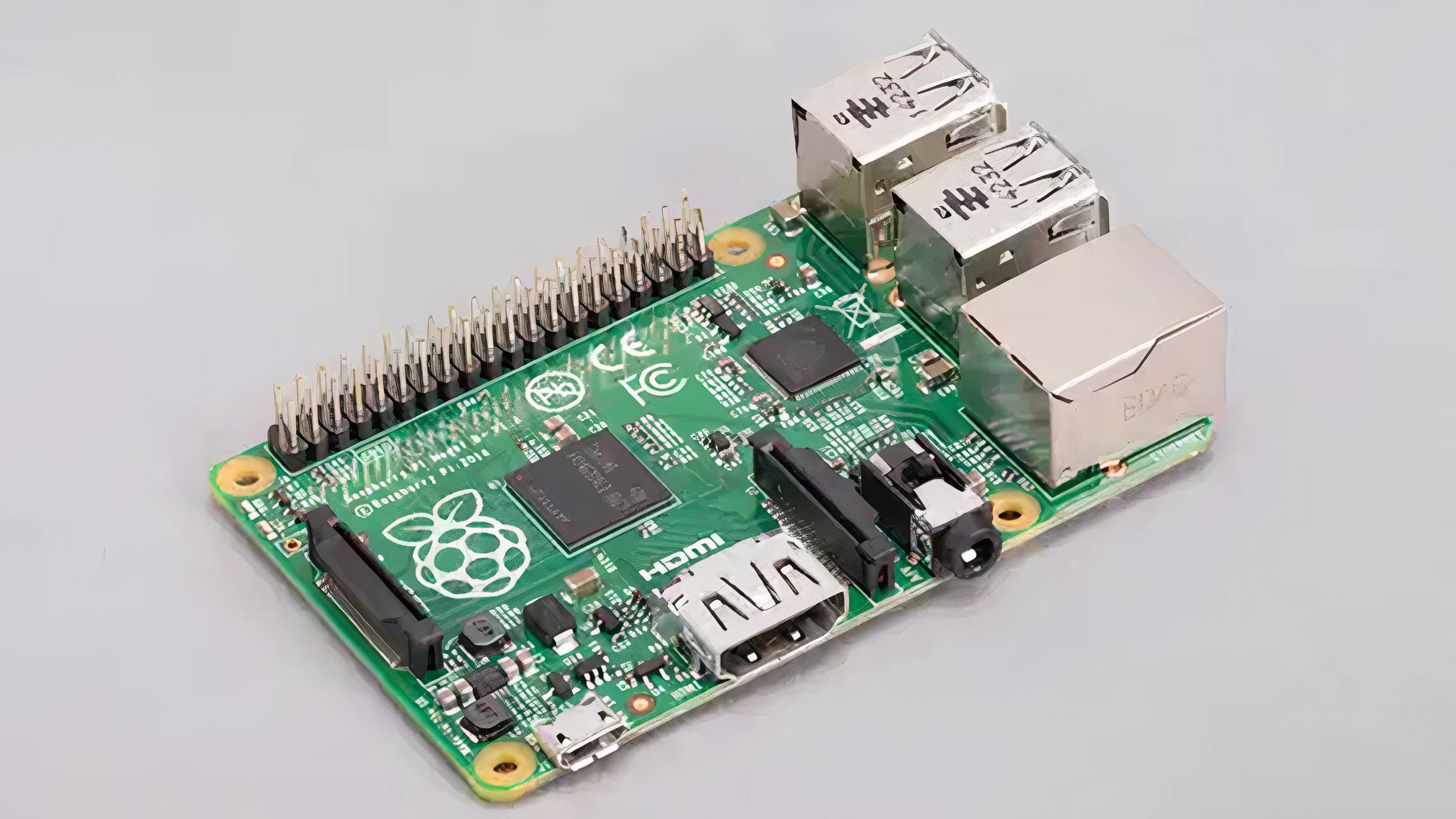 The Raspberry Pi 1 Model B+ on a gray background.
