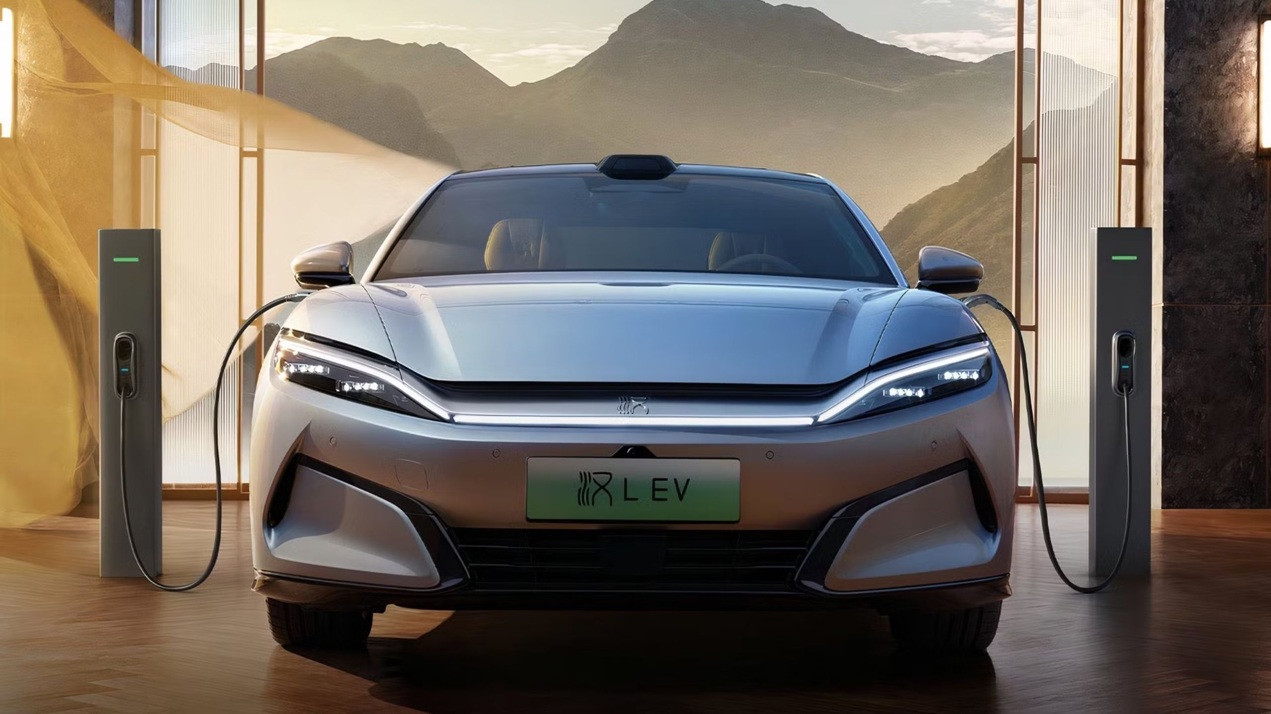 Image of the BYD Han L plugged in to chargers.