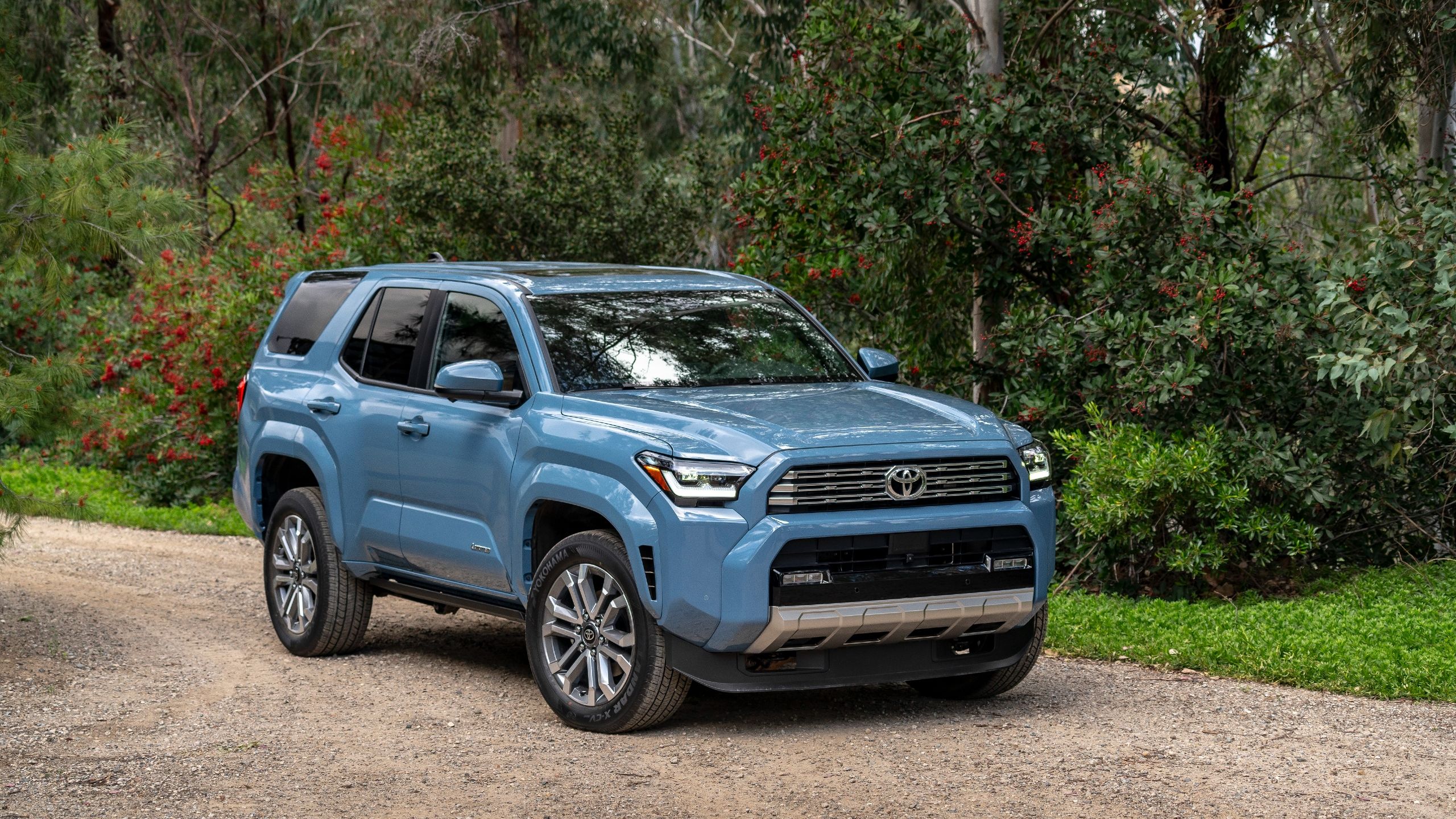 Front quarter view of the 2025 Toyota 4Runner parked on a dirt road.