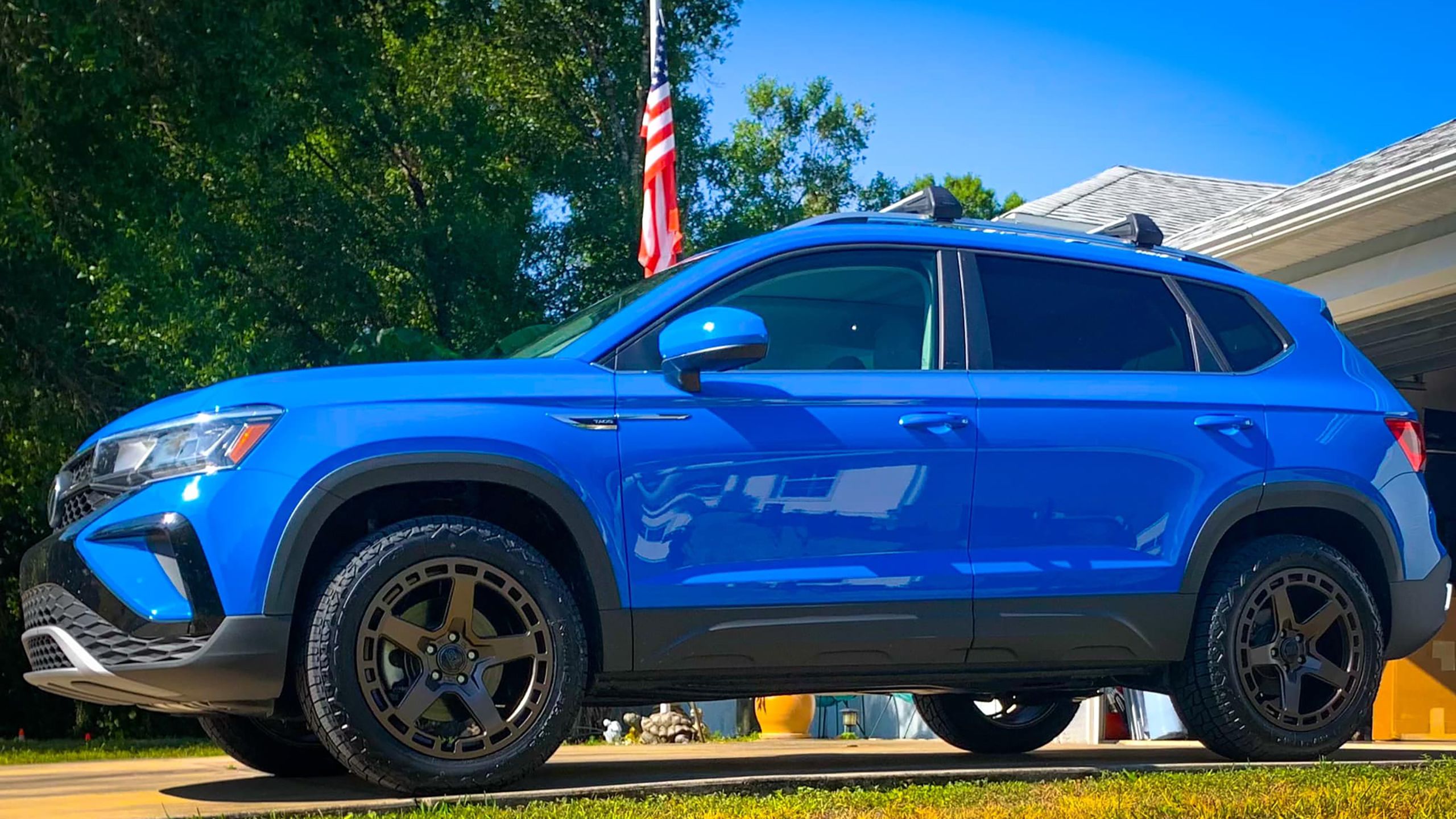 A 2022 Volkswagen Taos with a B2B Fab lift kit installed. 
