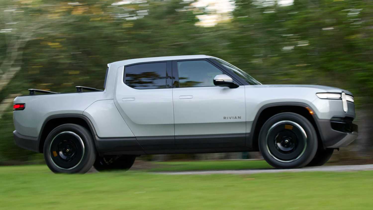 A Rivian R1T in motion.