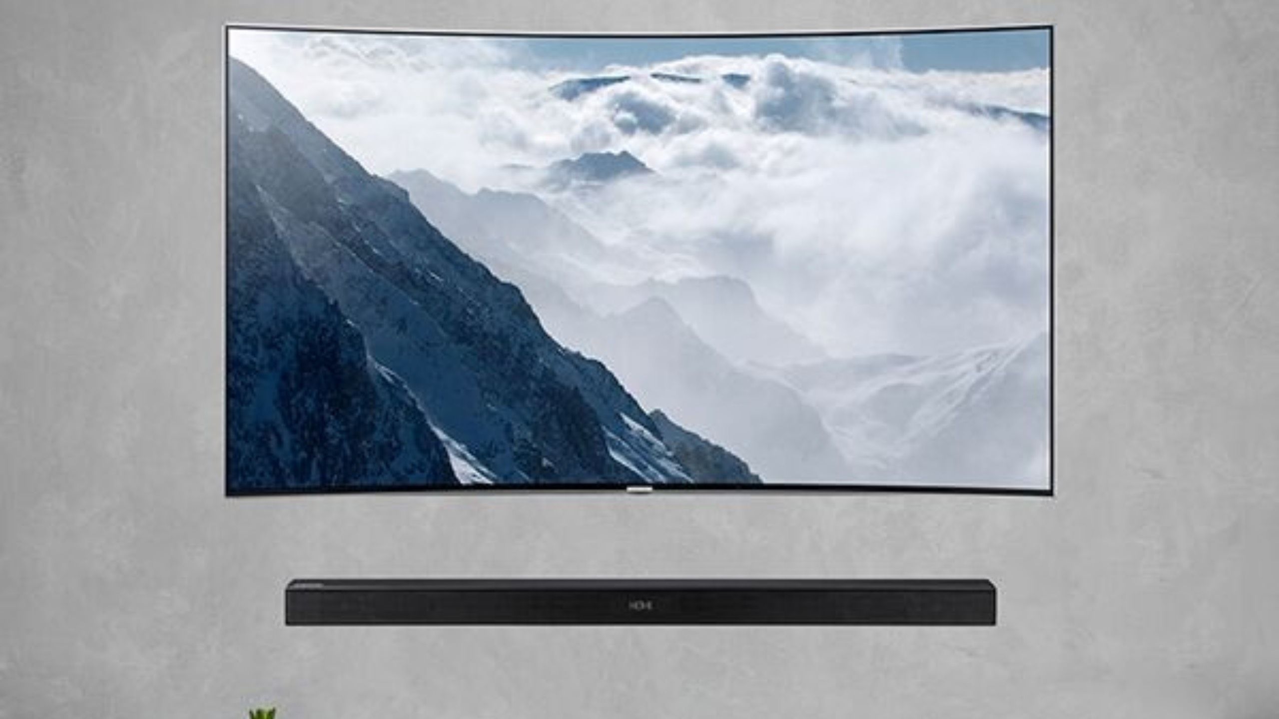 samsung TV with a mounted soundbar
