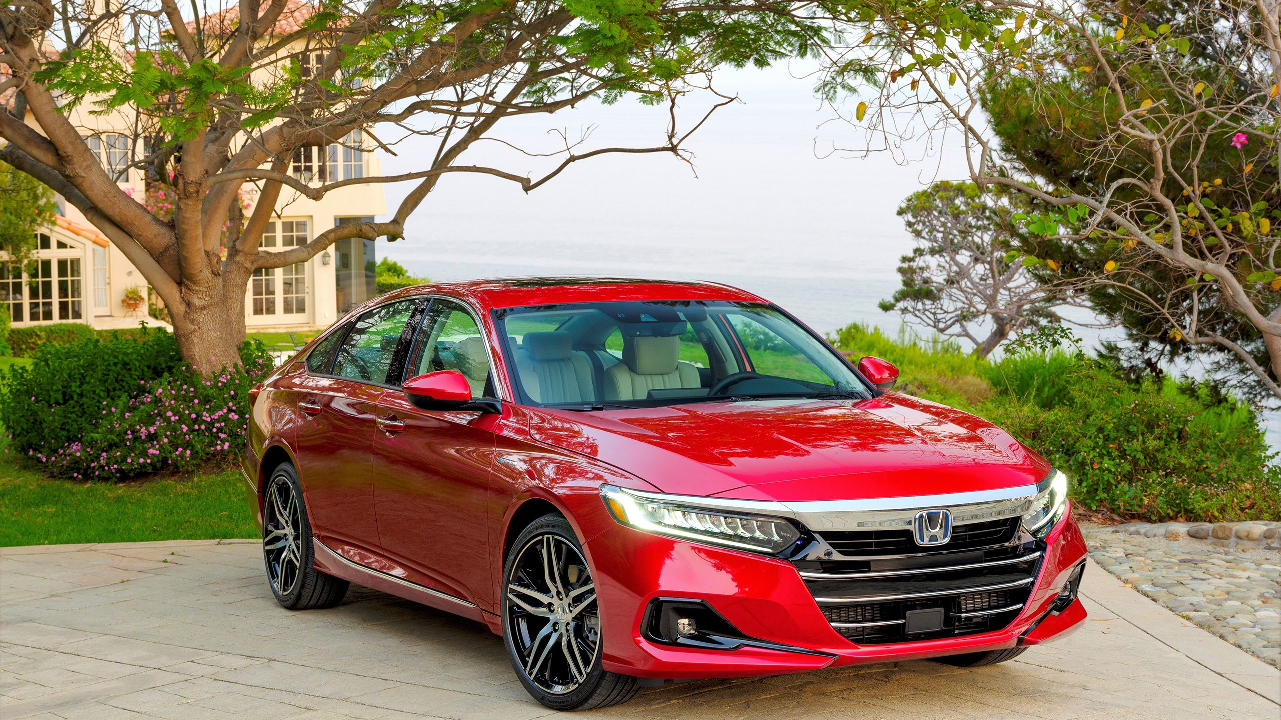 A red 2021 Honda Accord front, right quarter pannell.