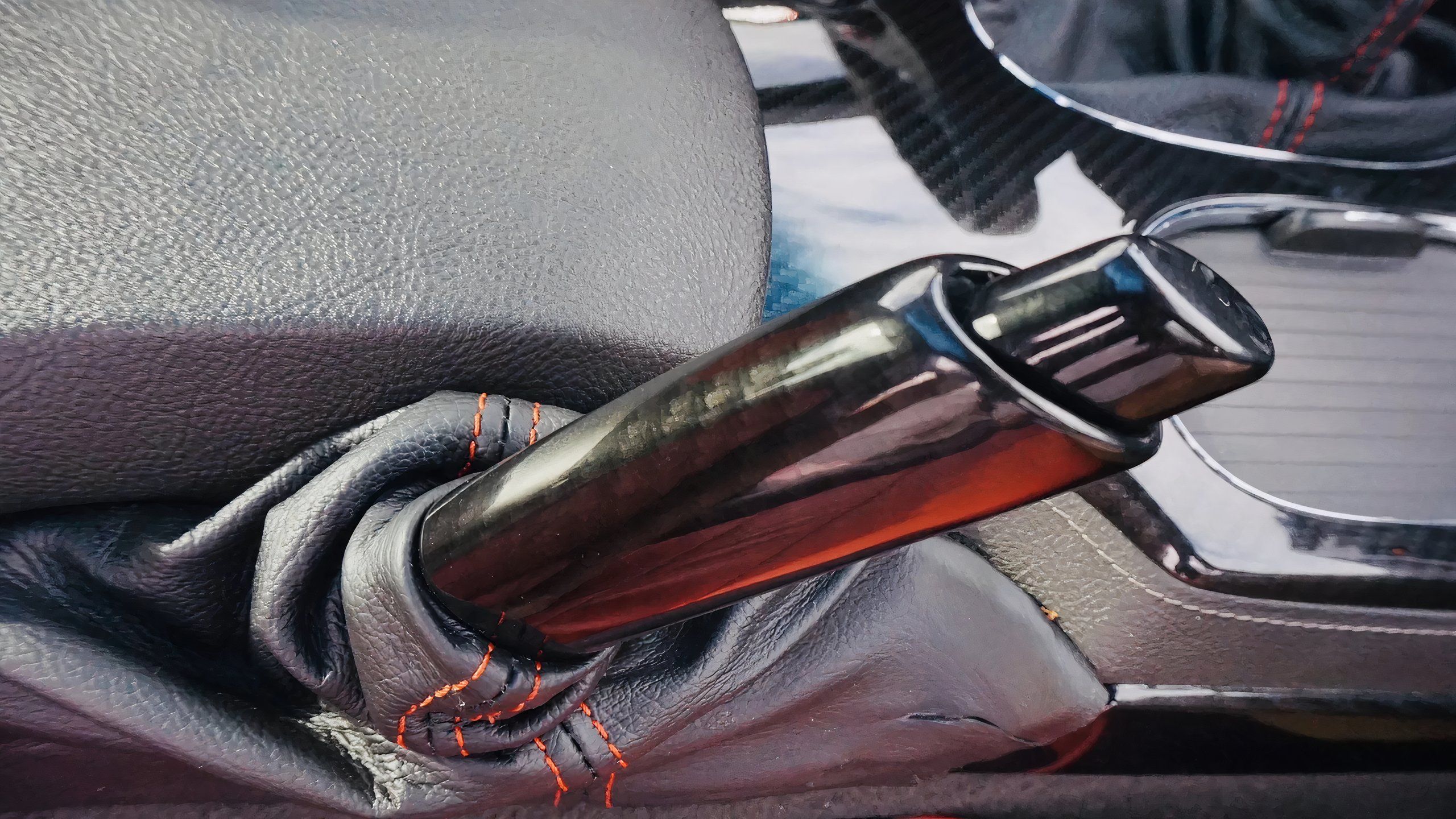An aftermarket handbrake lever mounted to a C6 Corvette. 