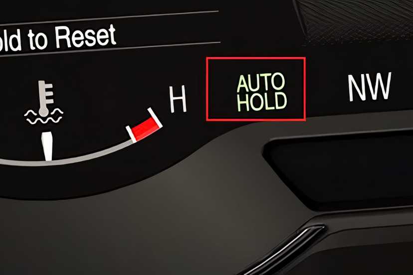 A still photo of a Ford Auto Hold brake light on a dash.