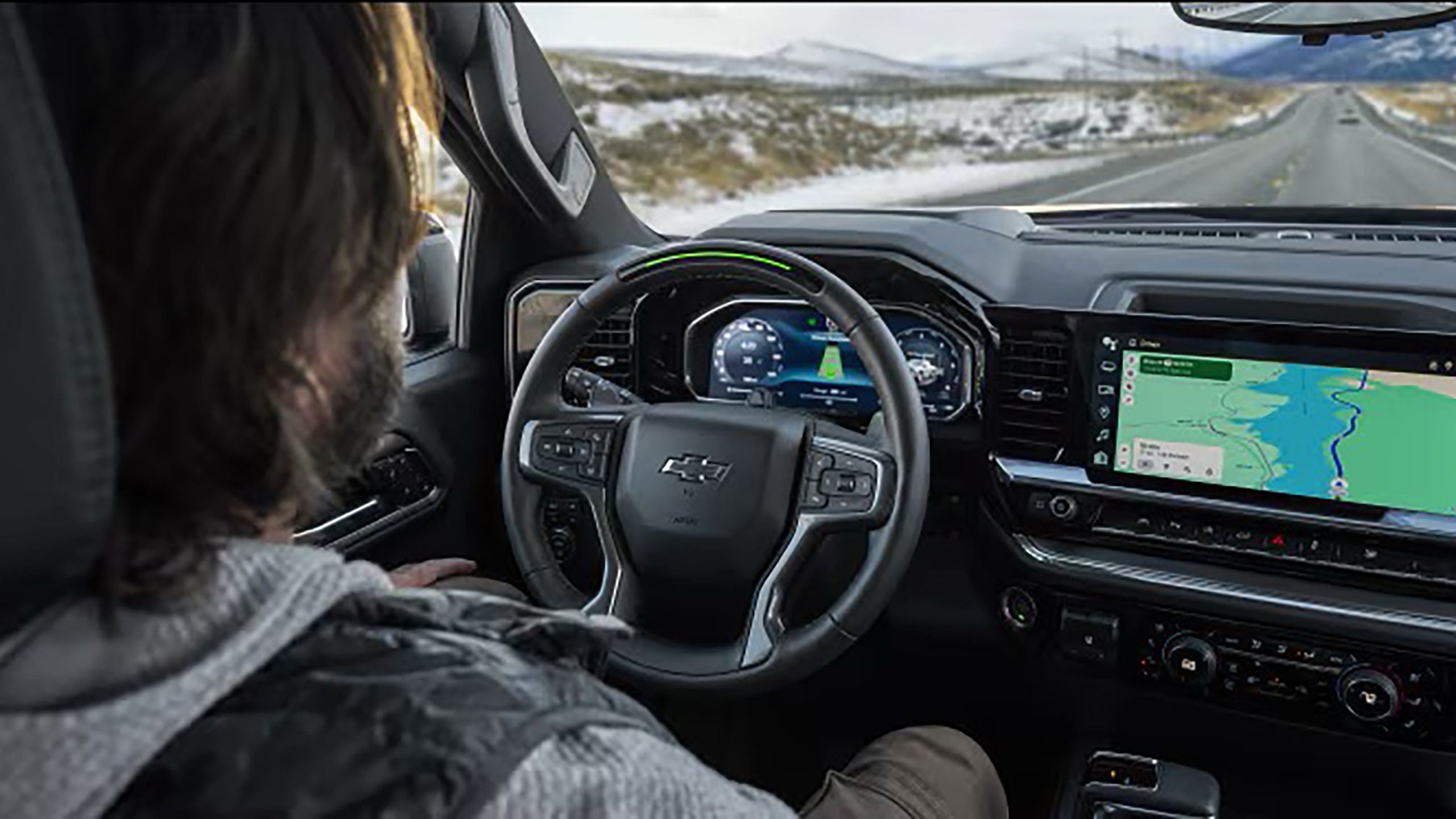 A driver using GM's Super Cruise feature on the open road. 