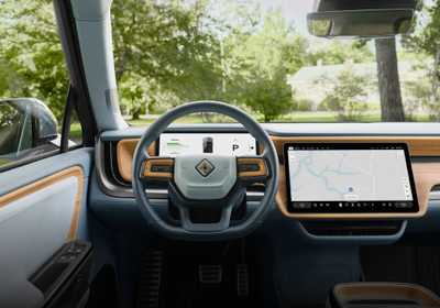 Staring out the driver's side of a Rivian R1T. 