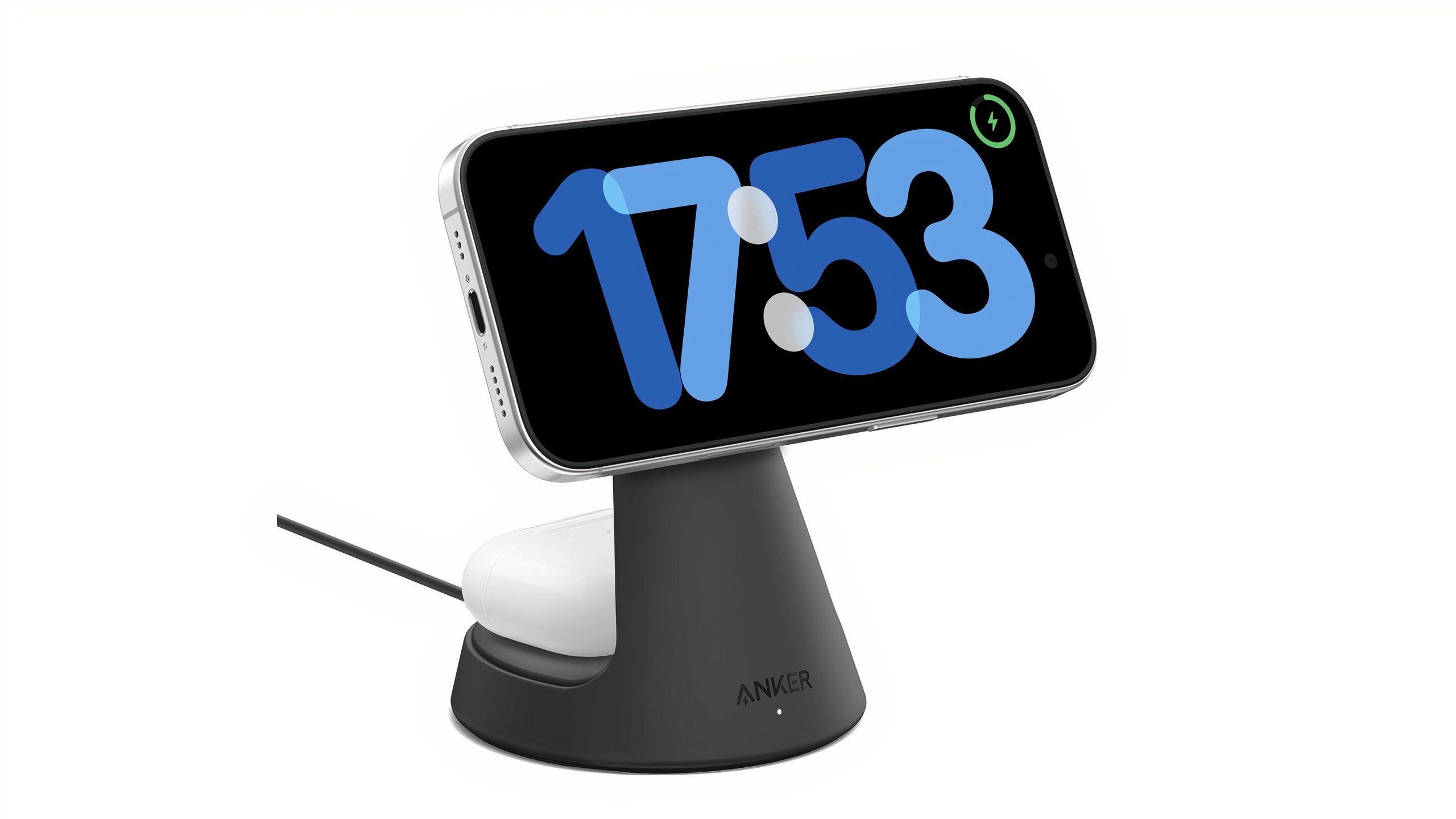 An iPhone mounted on a black Anker wireless charger with AirPods Pro charging in the back.