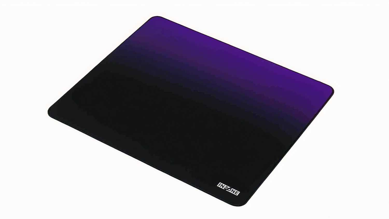 A large edge-stitched mousepad with a black to blue gradient and "Inzone" printed on it.