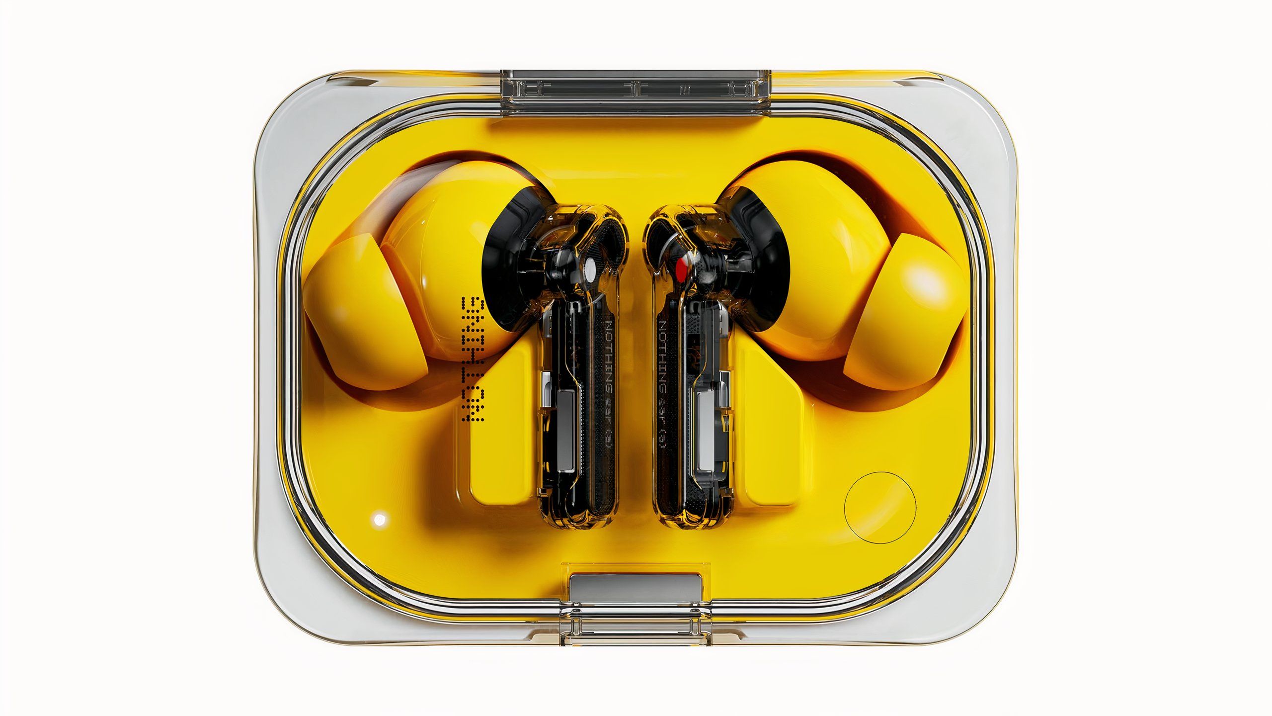 Yellow wireless earbuds in a clear plastic charging case.