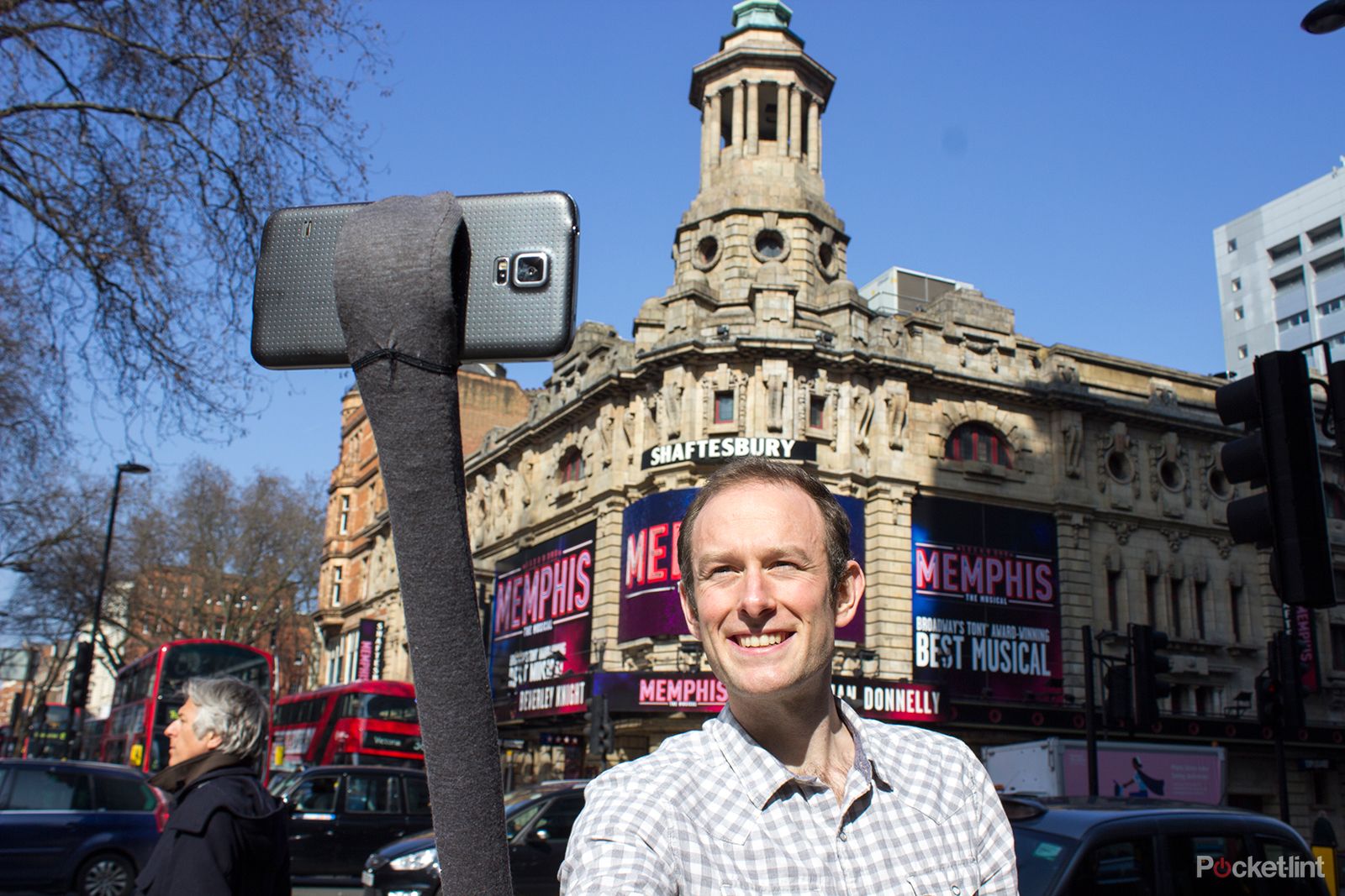 the pop stick a selfie stick you can snap to your wrist hands on  image 1