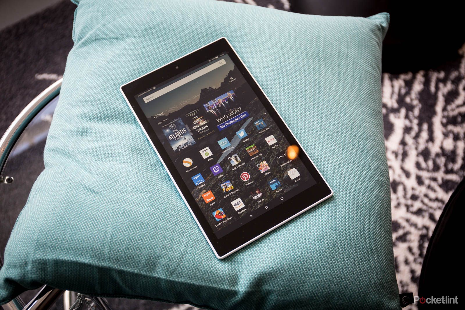 Amazon Fire HD 8 display against a pillow. 