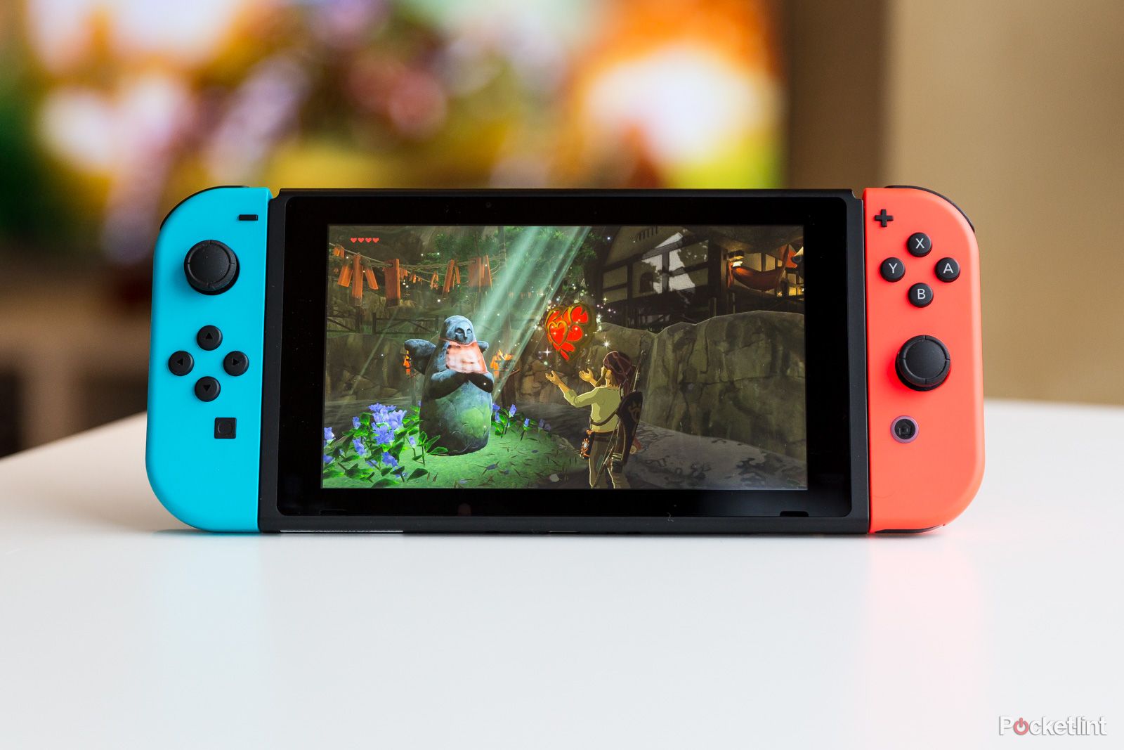 Zelda breath of the wild on a Nintendo Switch with red and blue joy cons