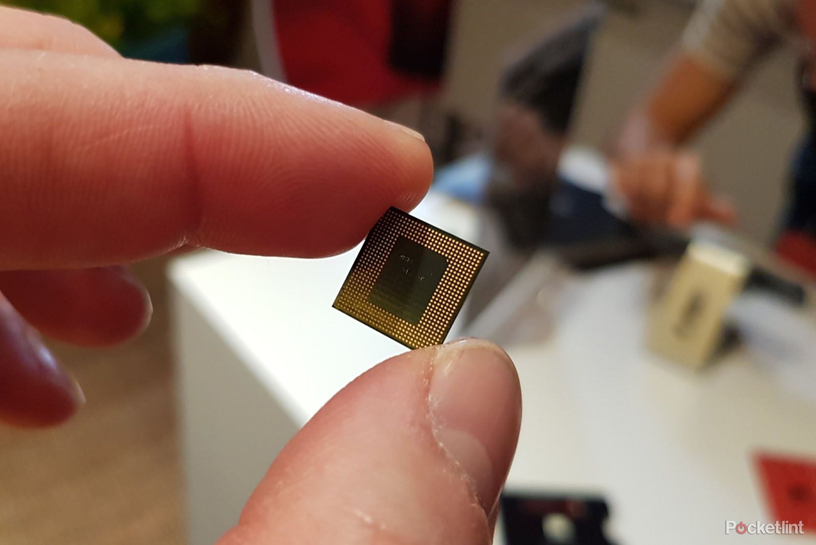 Qualcomm Snapdragon 845 chip between fingers