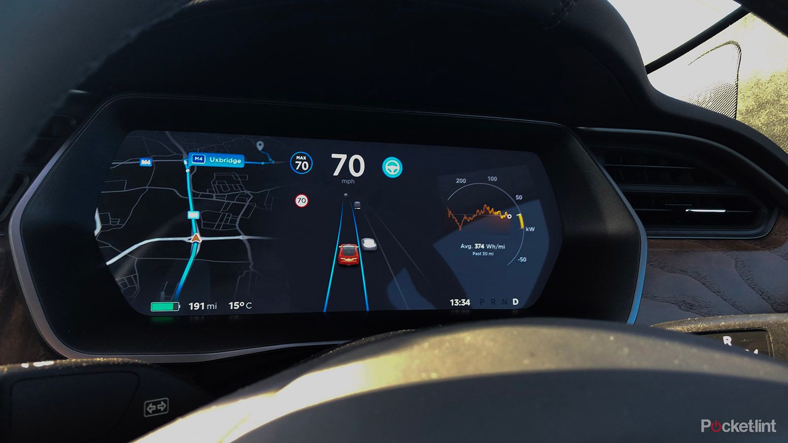 A Tesla dashboard display the car's autopilot software