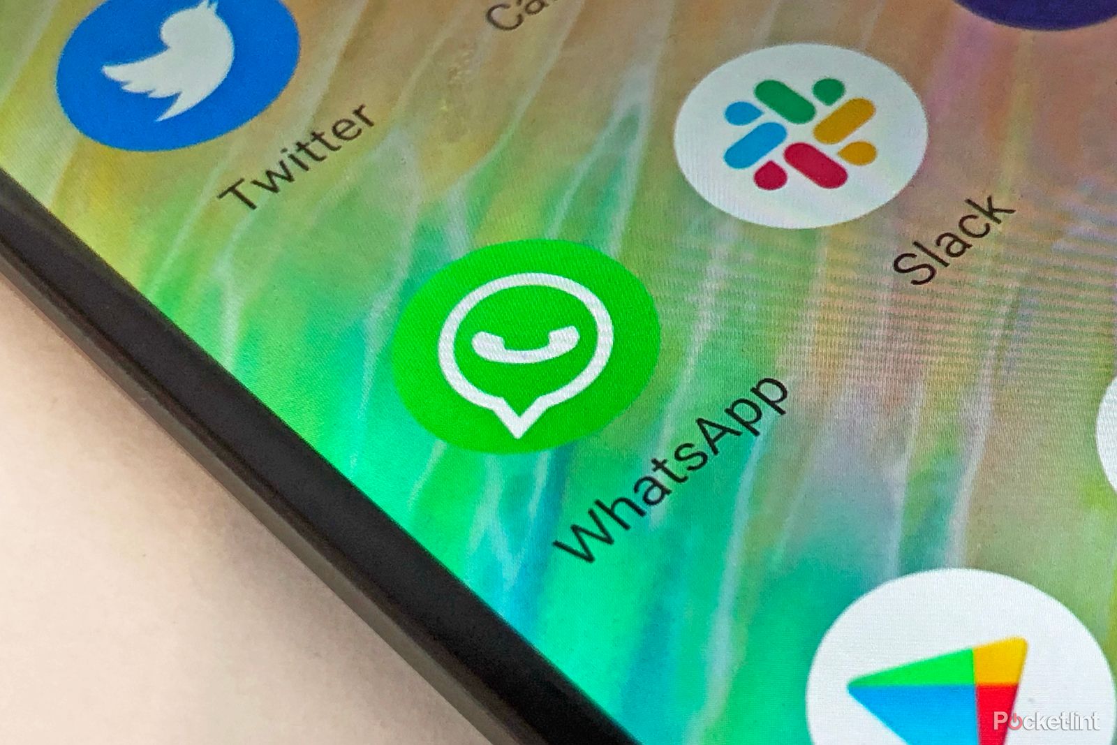 WhatsApp app icon on a phone