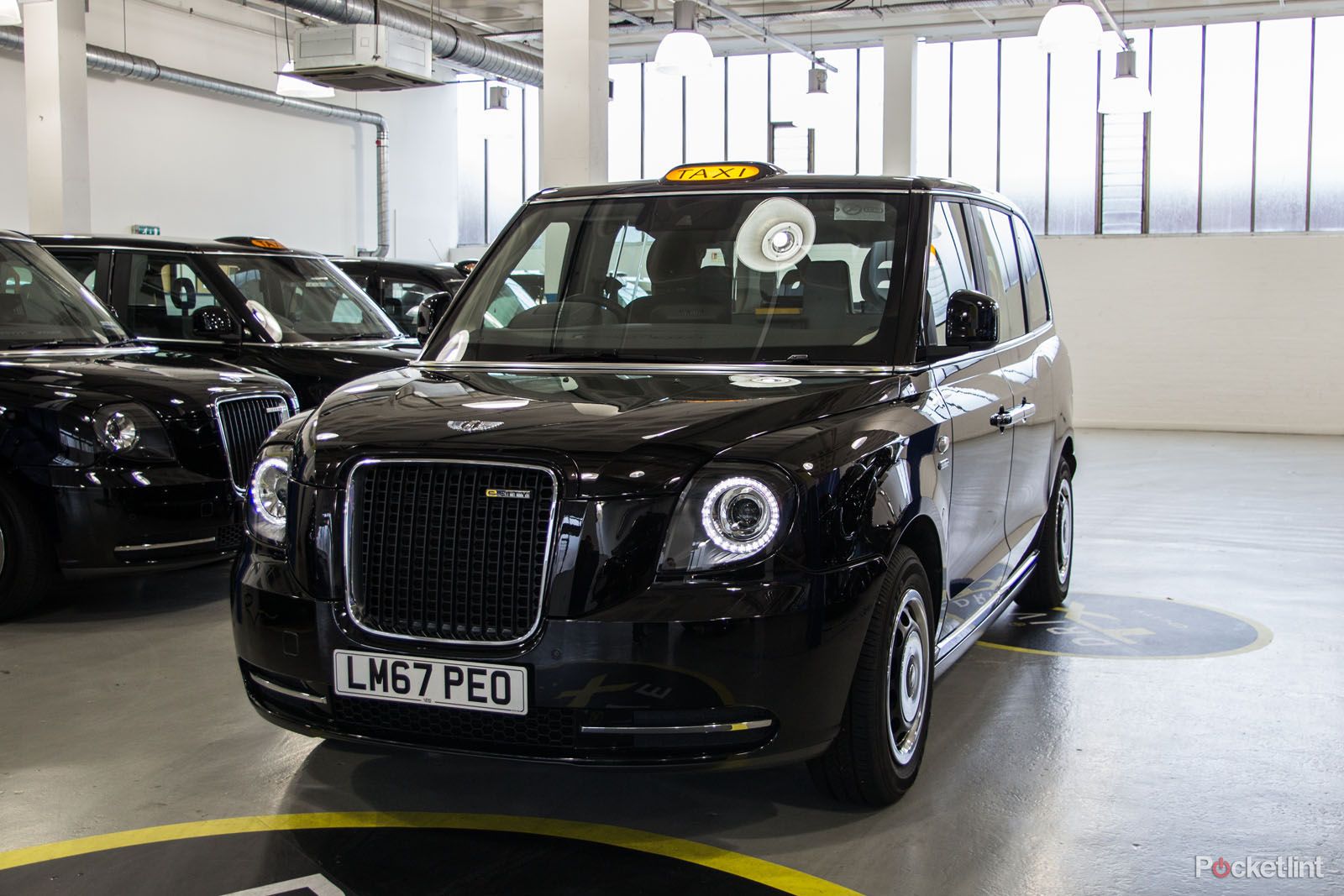 Electric taxis could be charged wirelessly in future UK trial underway image 1