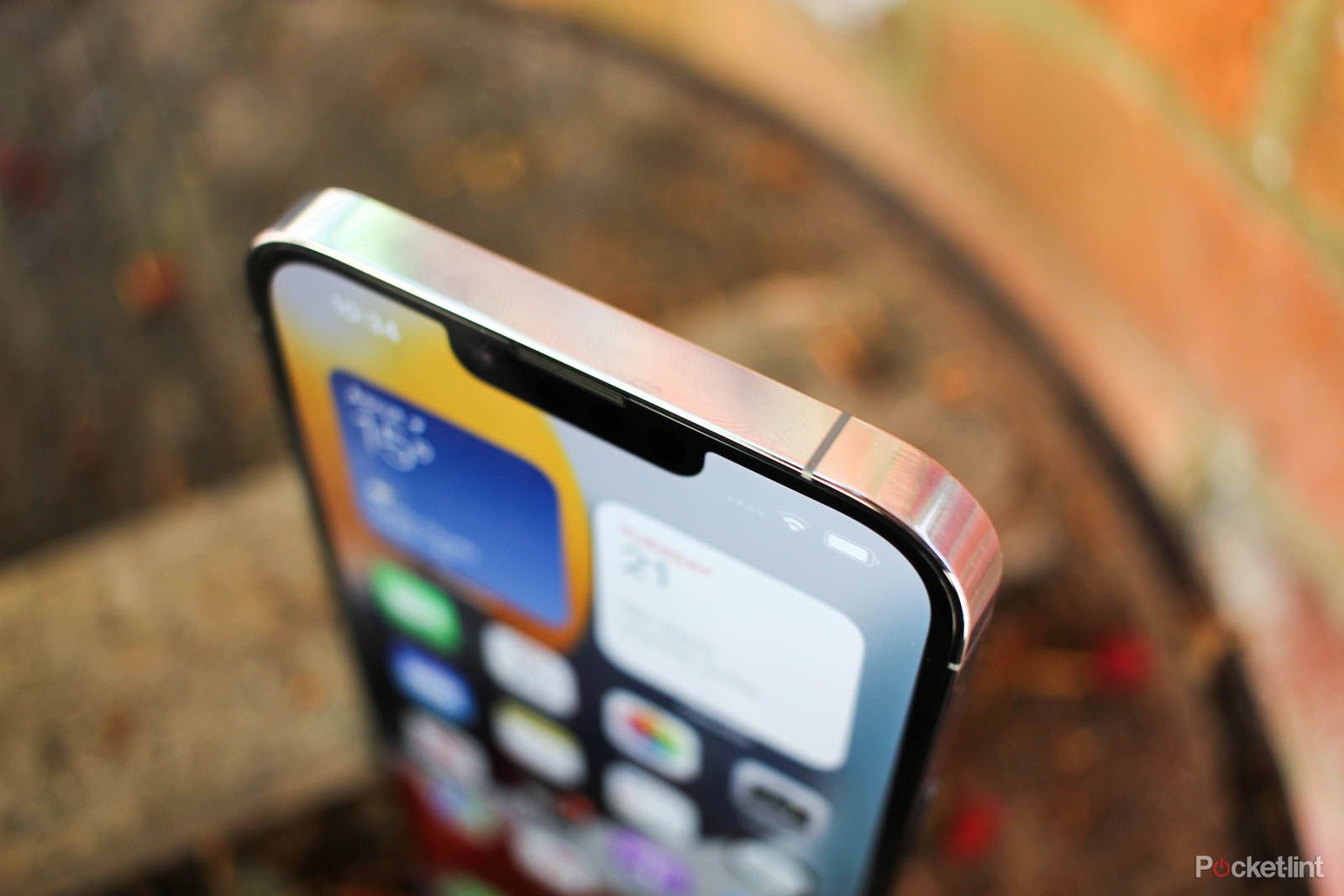 iPhone 13 from the front, showing the Face ID notch.