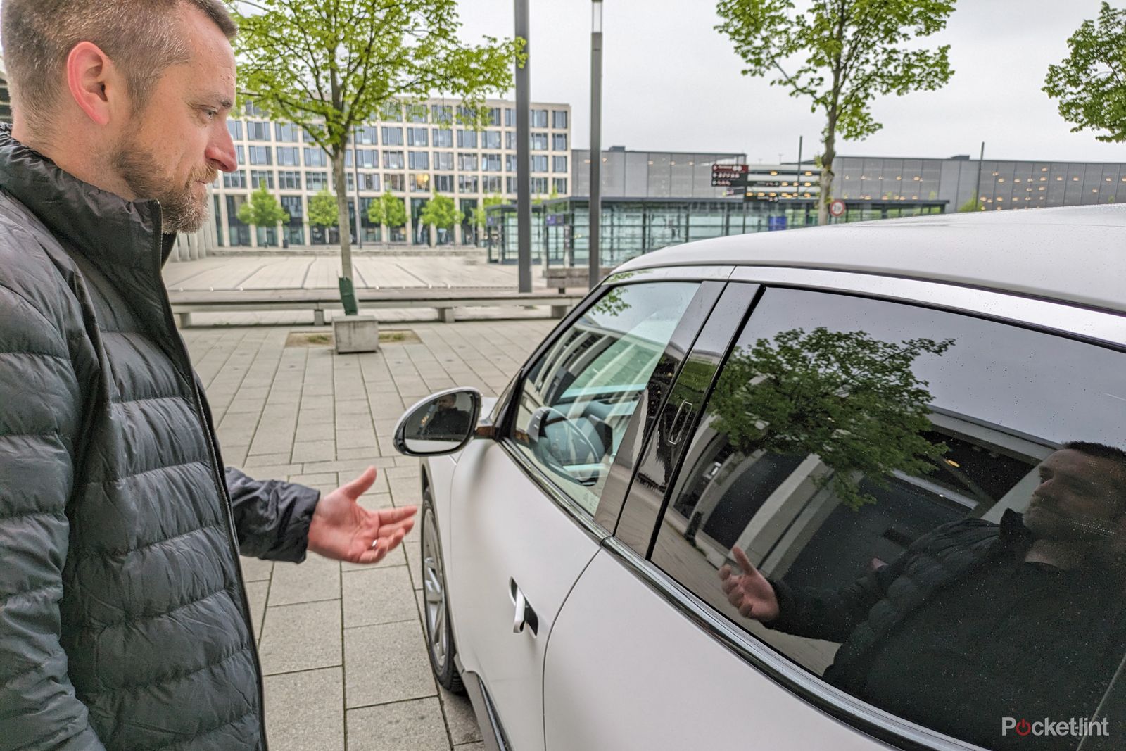 man unlocking car with face