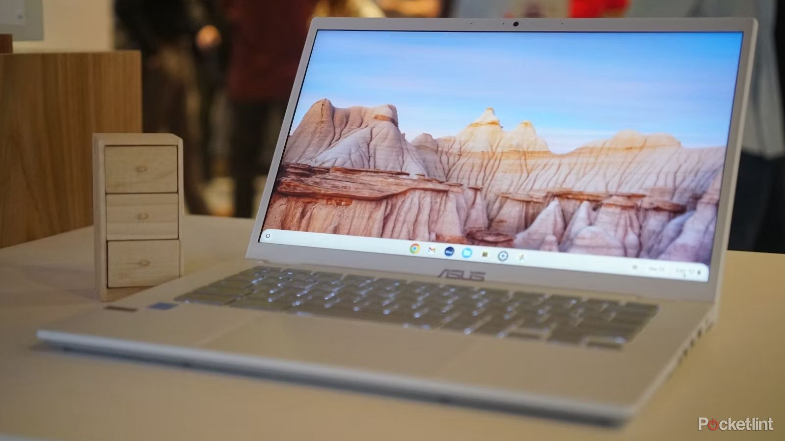 A Chromebook computer on a table. 