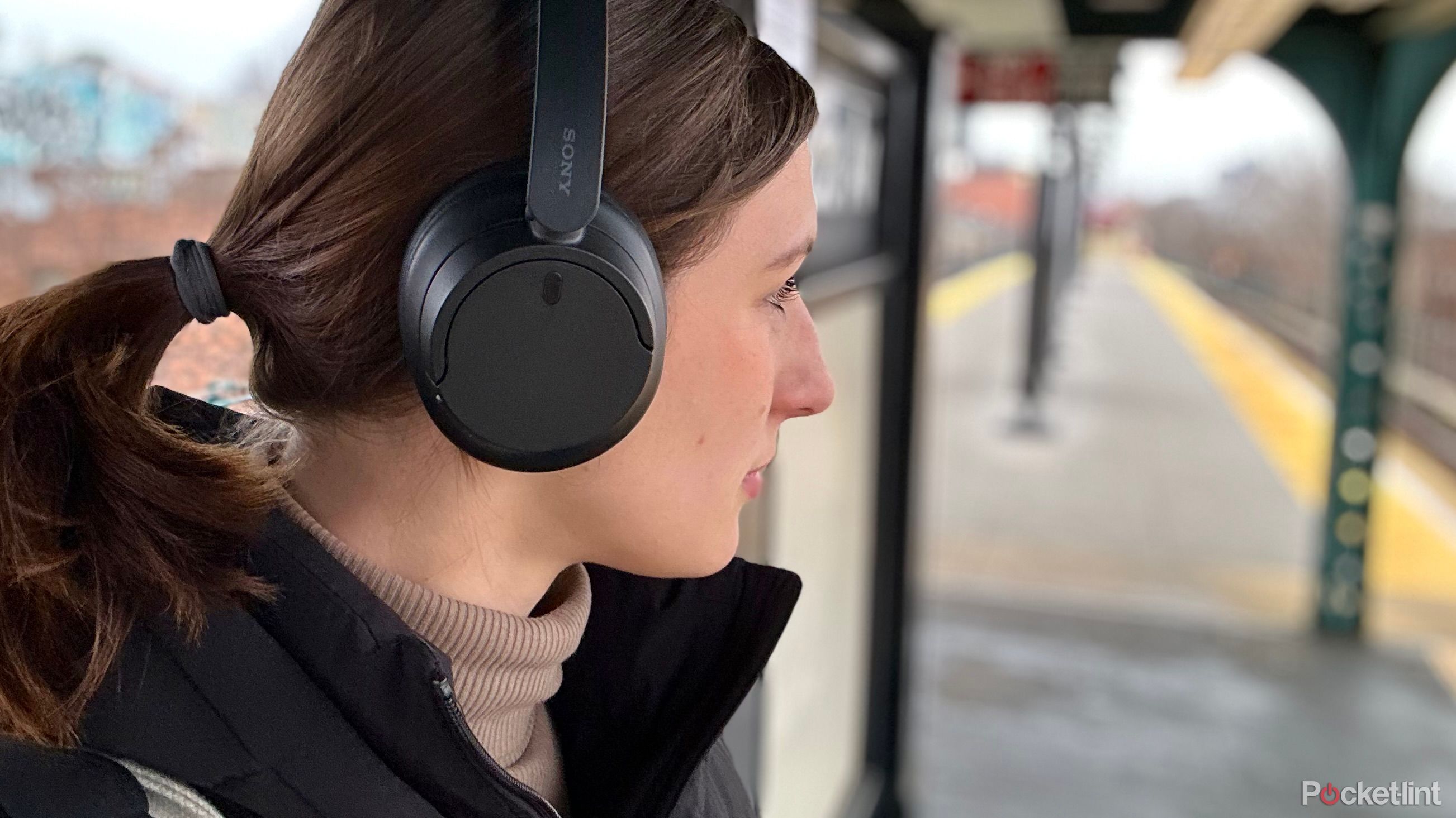 headphones at train stop