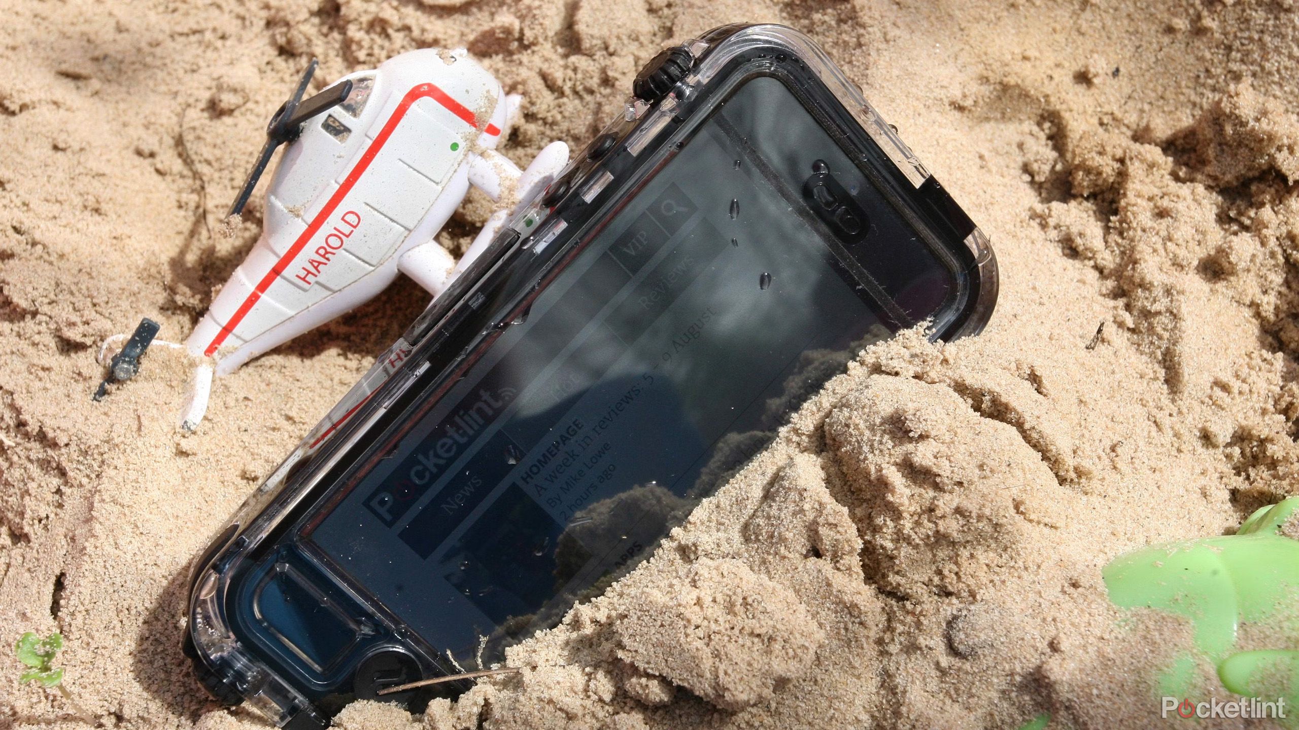 A smartphone in the sand