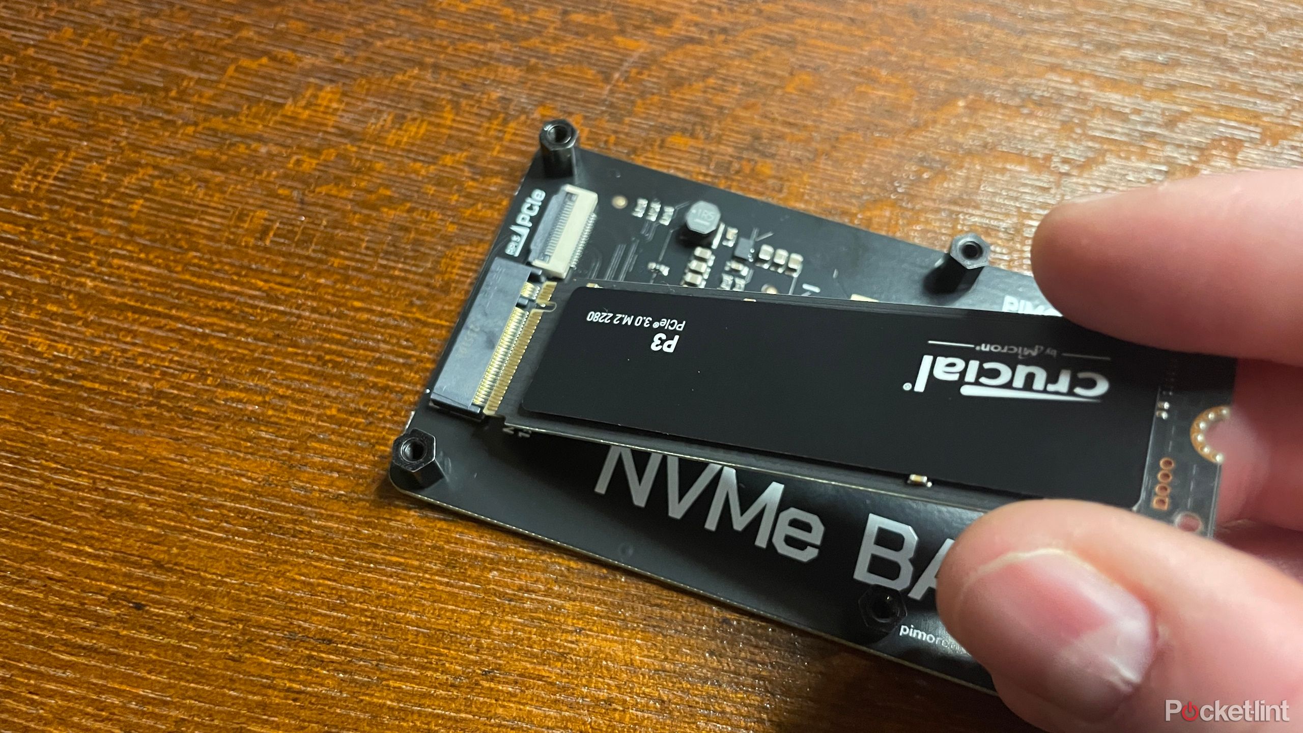 SSD being connected to Pimoroni NVMe Base for Rapsberry Pi 5