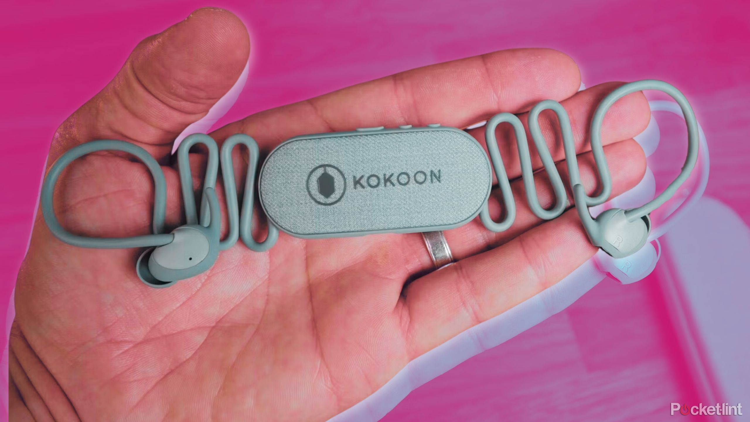 Person holding Kokoon sleeping earbuds and their case